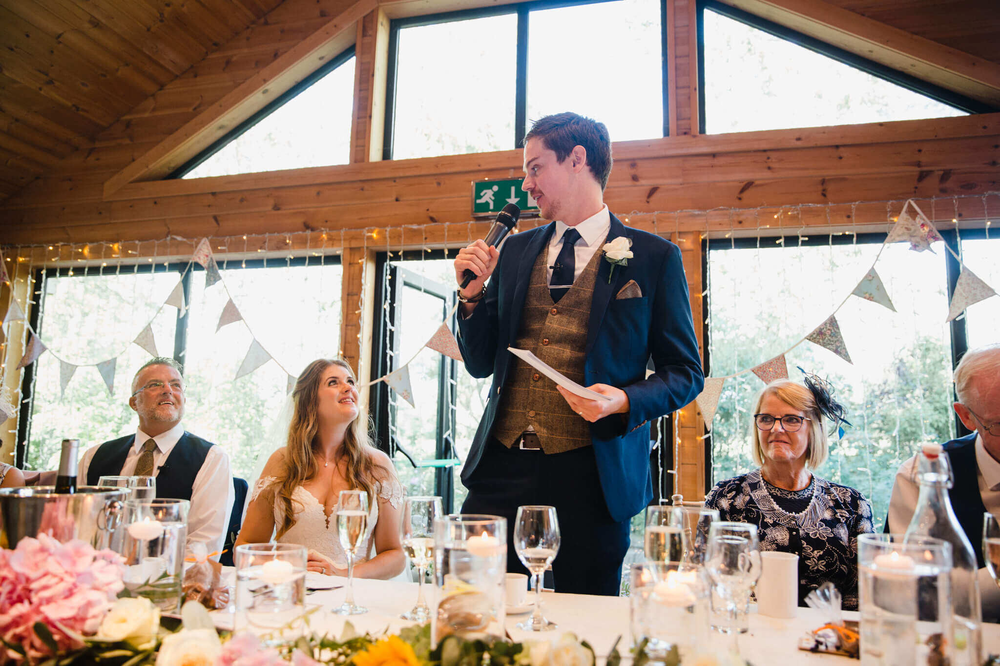 groom on top table giving speech