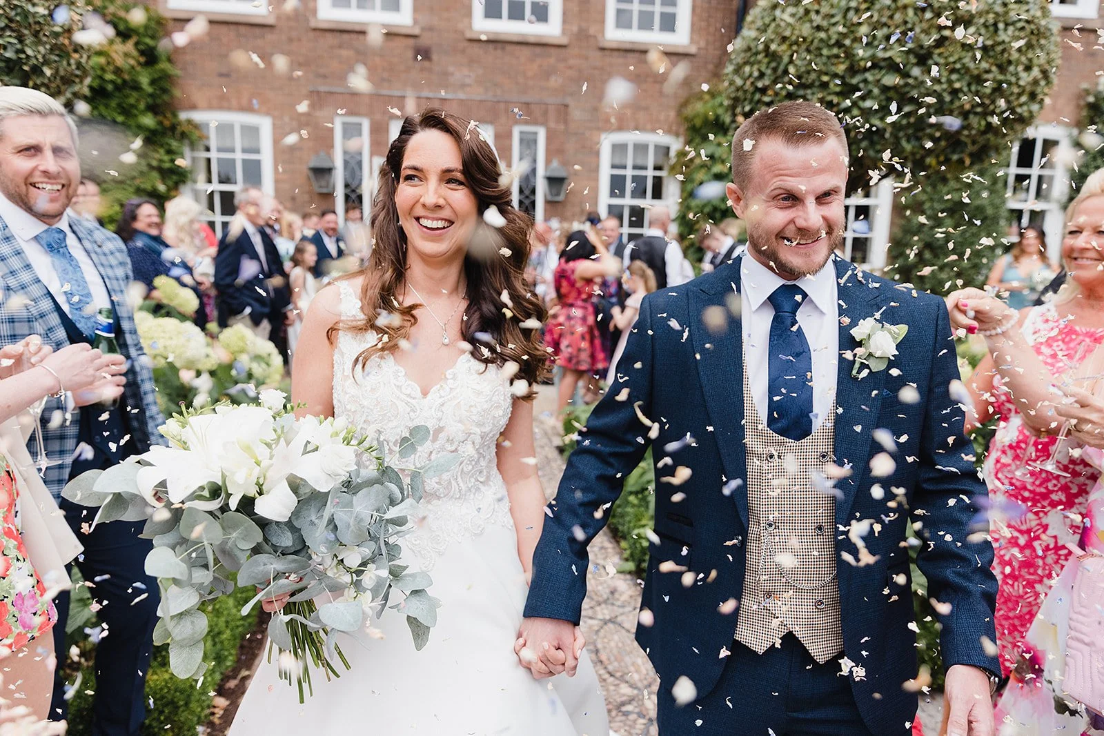 manchester-wedding-photographer-confetti-celebration-outdoors.jpg