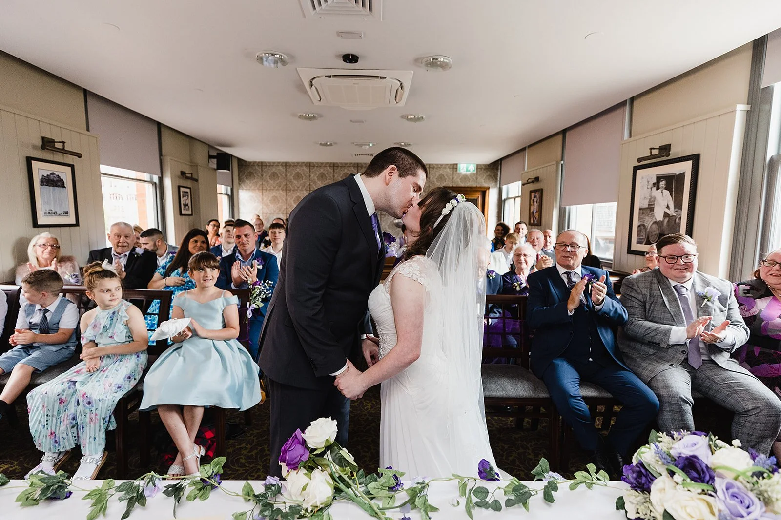 rain-bar-wedding-venue-manchester-ceremony-kiss.jpg