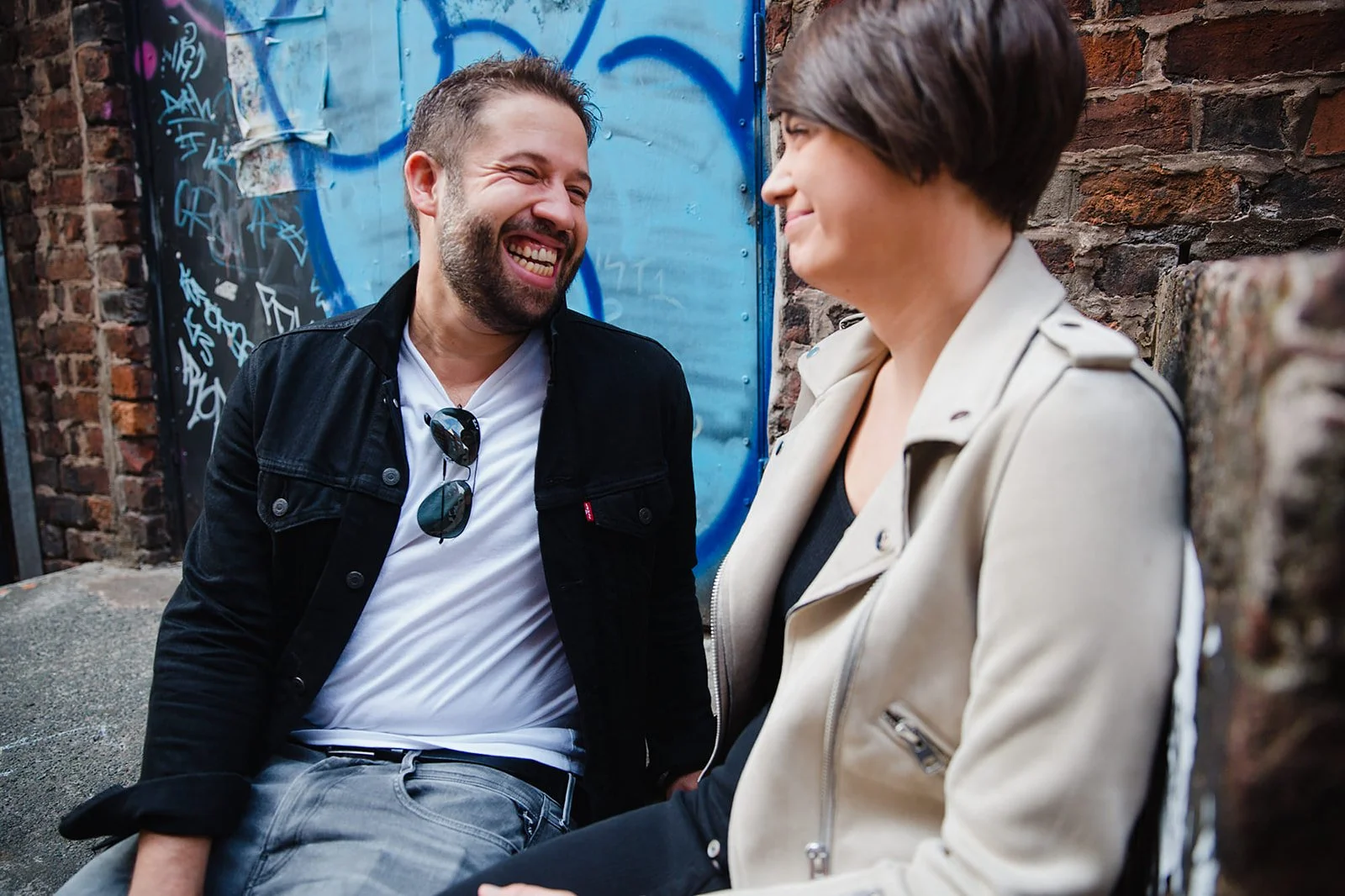 stevenson-square-northern-quarter-couple-laughing-graffiti-wall.jpg