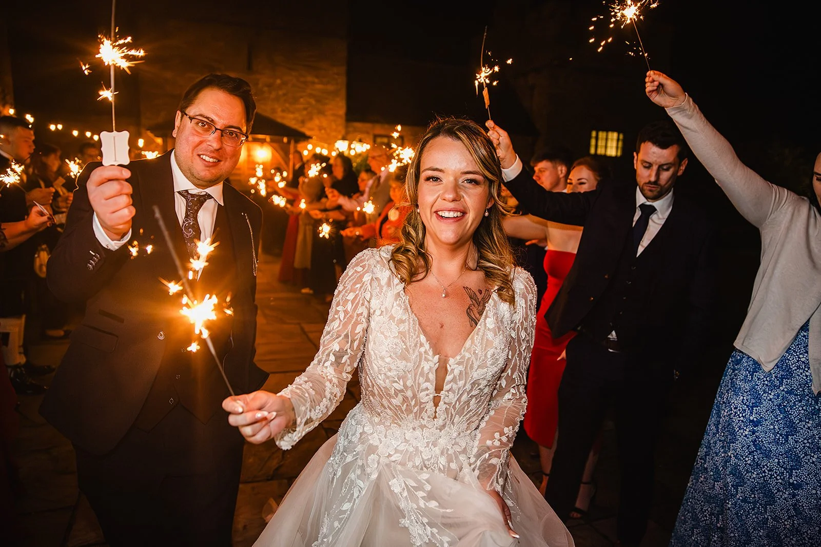 rowton-castle-wedding-photography-night-sparkler-exit.jpg