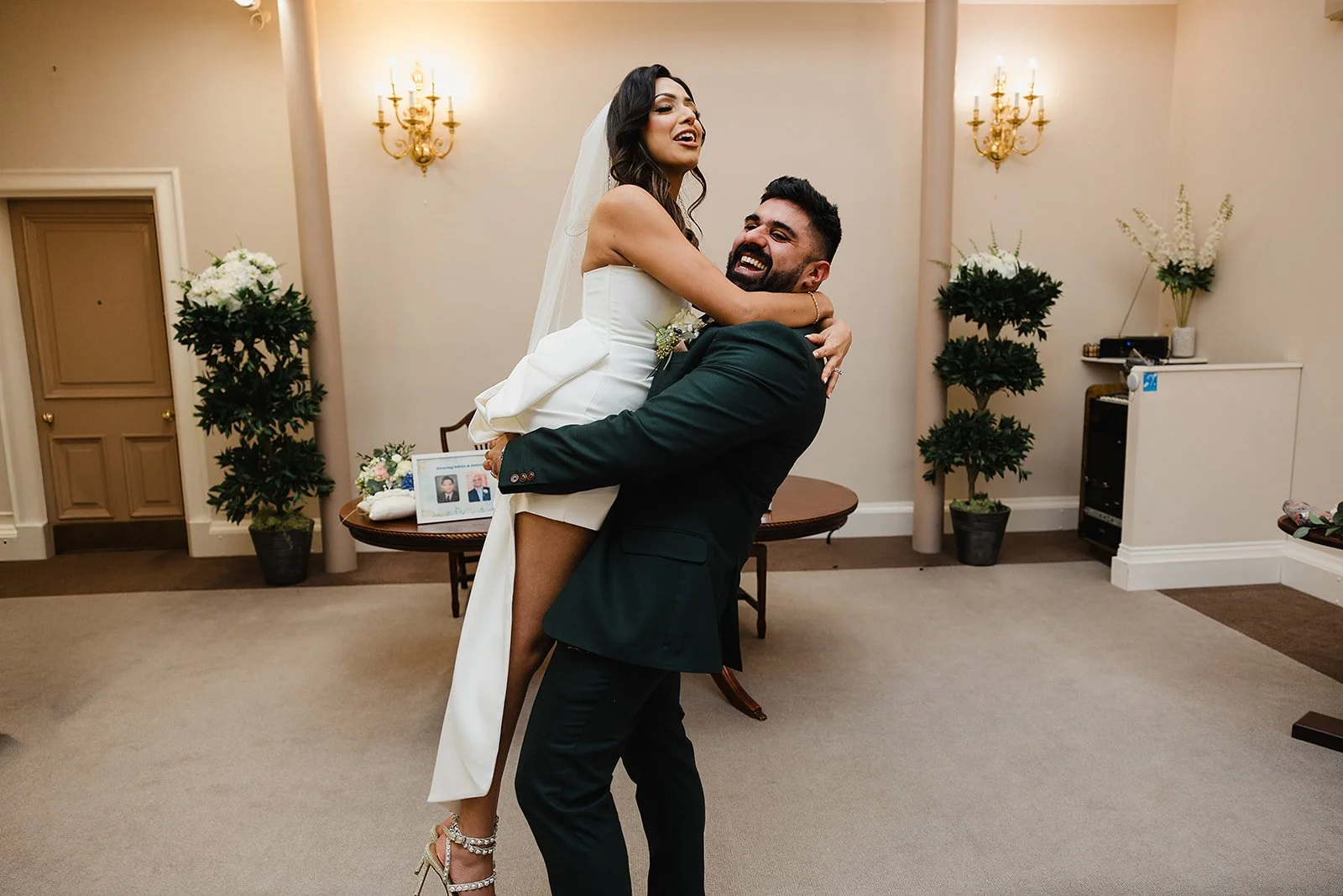 stockport-town-hall-wedding-couple-lift-nikita-antash.jpg