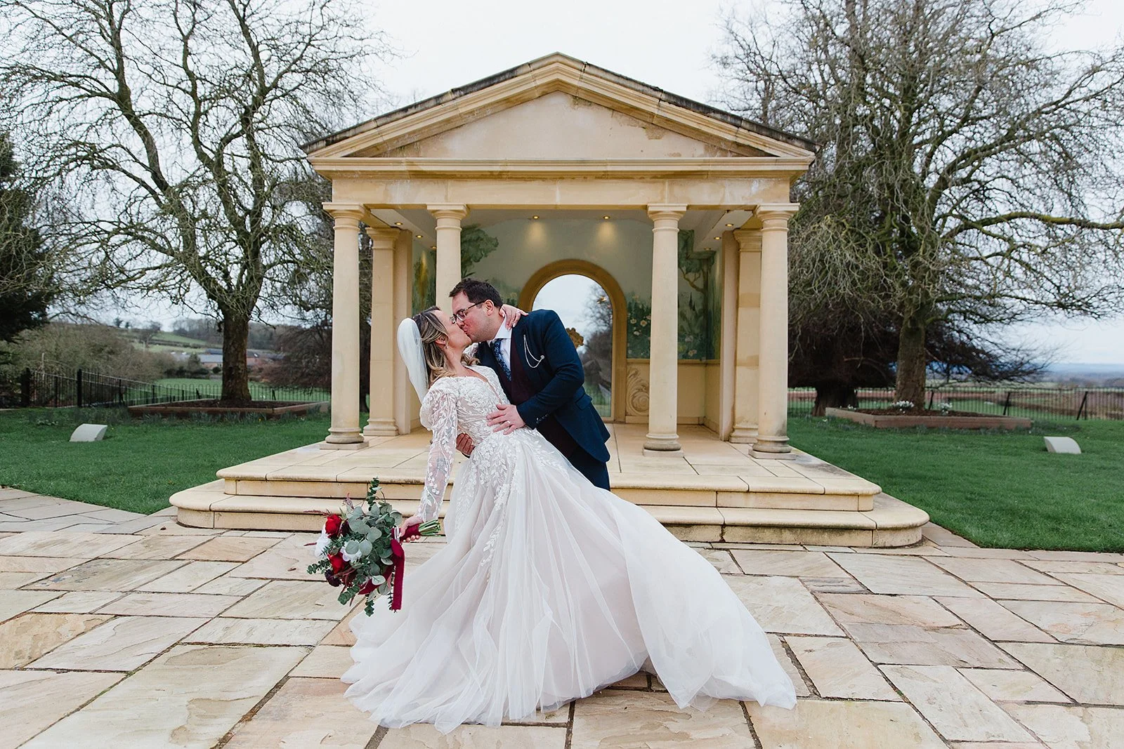 rowton-castle-wedding-pavilion-kiss-jade-gus.jpg
