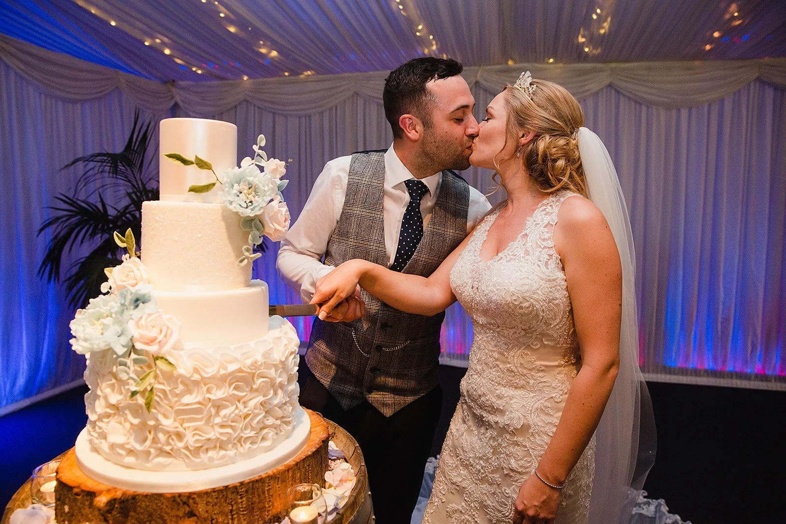 heaton-house-farm-wedding-cake-cutting.jpg