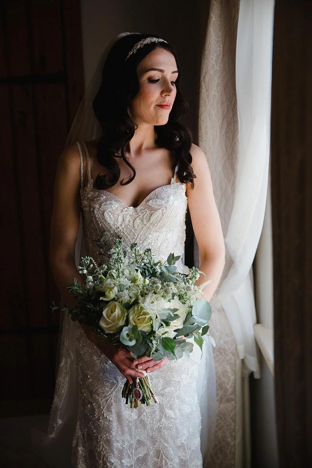 heaton-house-farm-wedding-bride-window-portrait.jpg