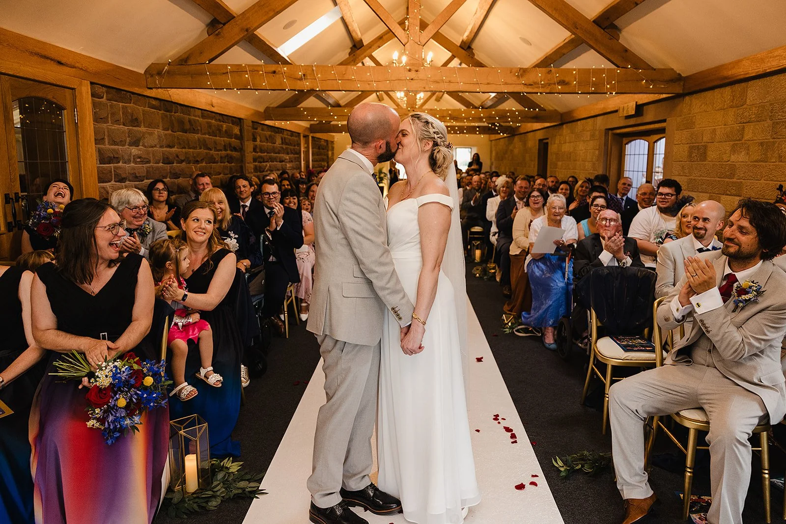 heaton-house-farm-wedding-ceremony-first-kiss.jpg