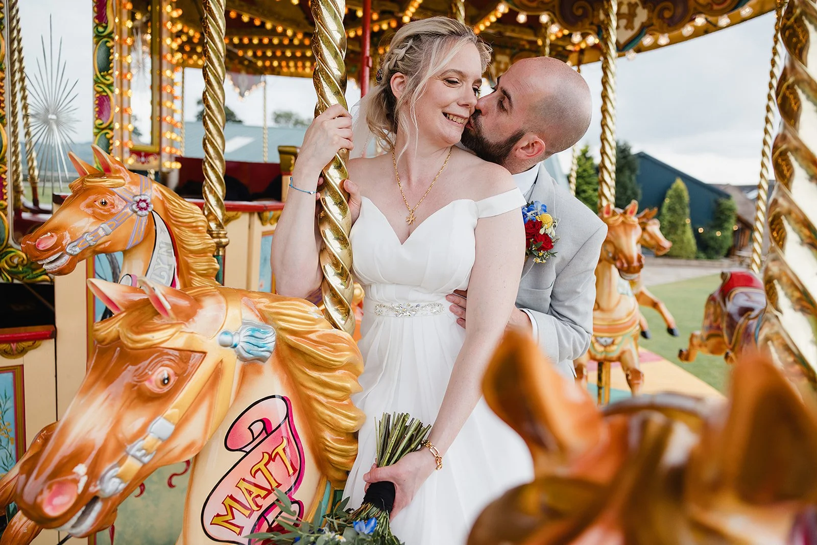 heaton-house-farm-wedding-photography-carousel-ride.jpg