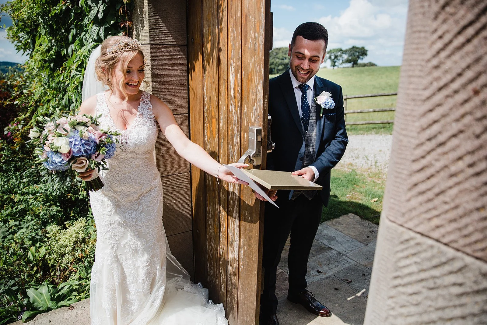 heaton-house-farm-wedding-first-look-water-gardens-gate.jpg