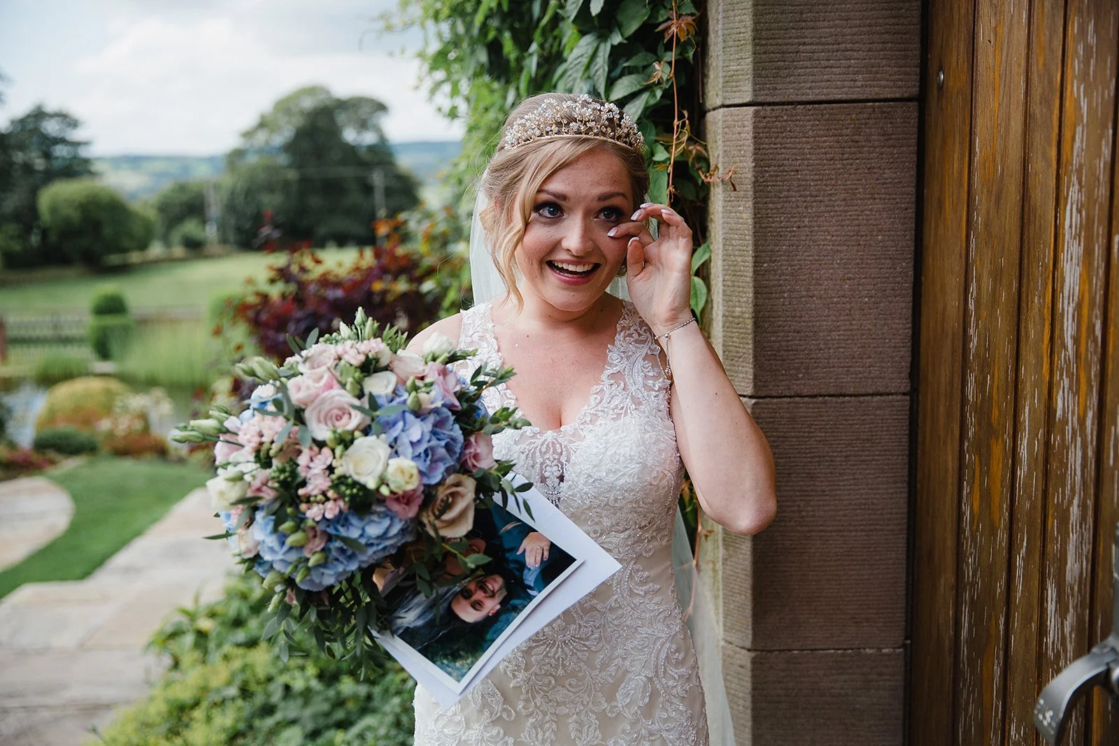 heaton-house-farm-wedding-first-look-garden-gate-portrait.jpg