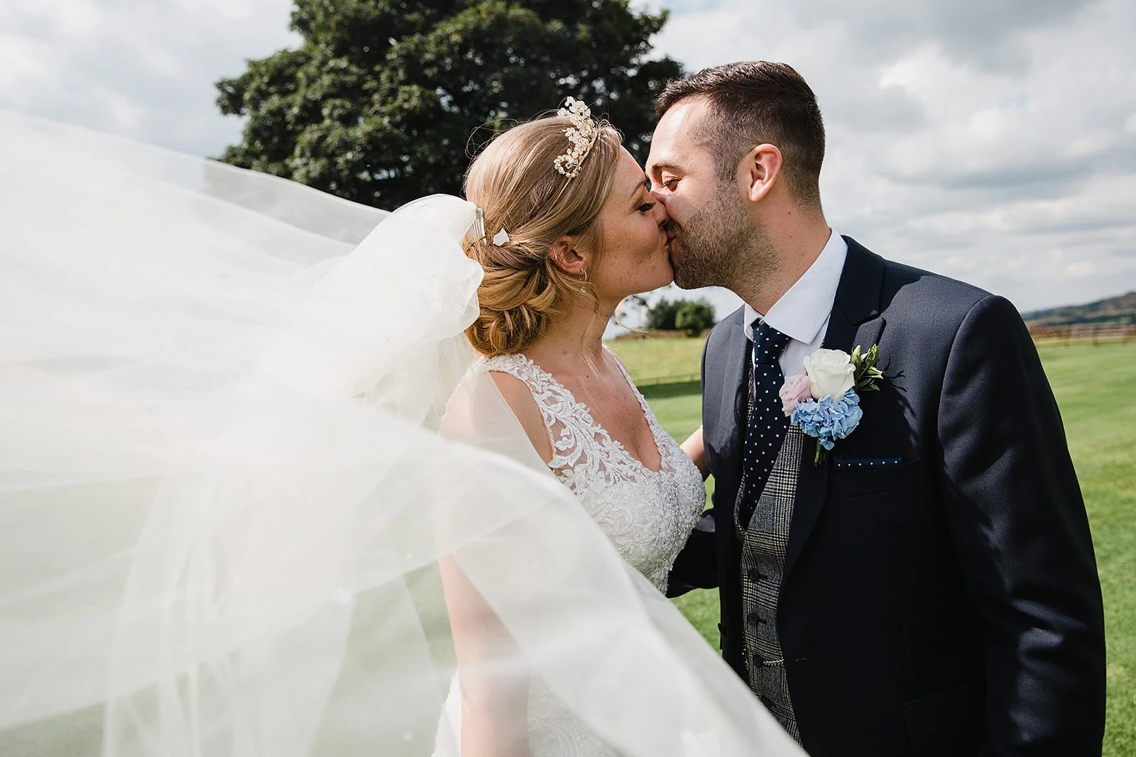 heaton-house-farm-wedding-portrait-kiss-sycamore-tree.jpg