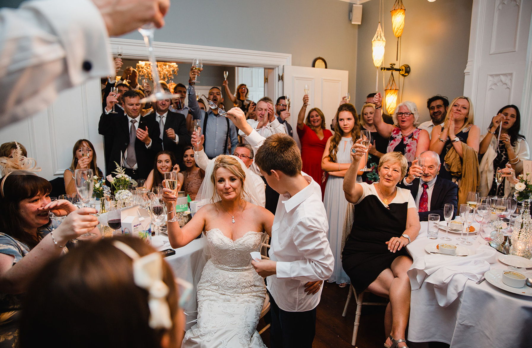didsbury-house-hotel-blue-lounge-bride-toast-seated.jpg