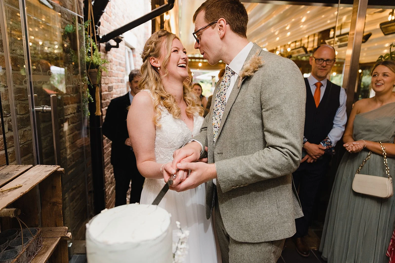 didsbury-house-hotel-cake-cutting-laughter.jpg