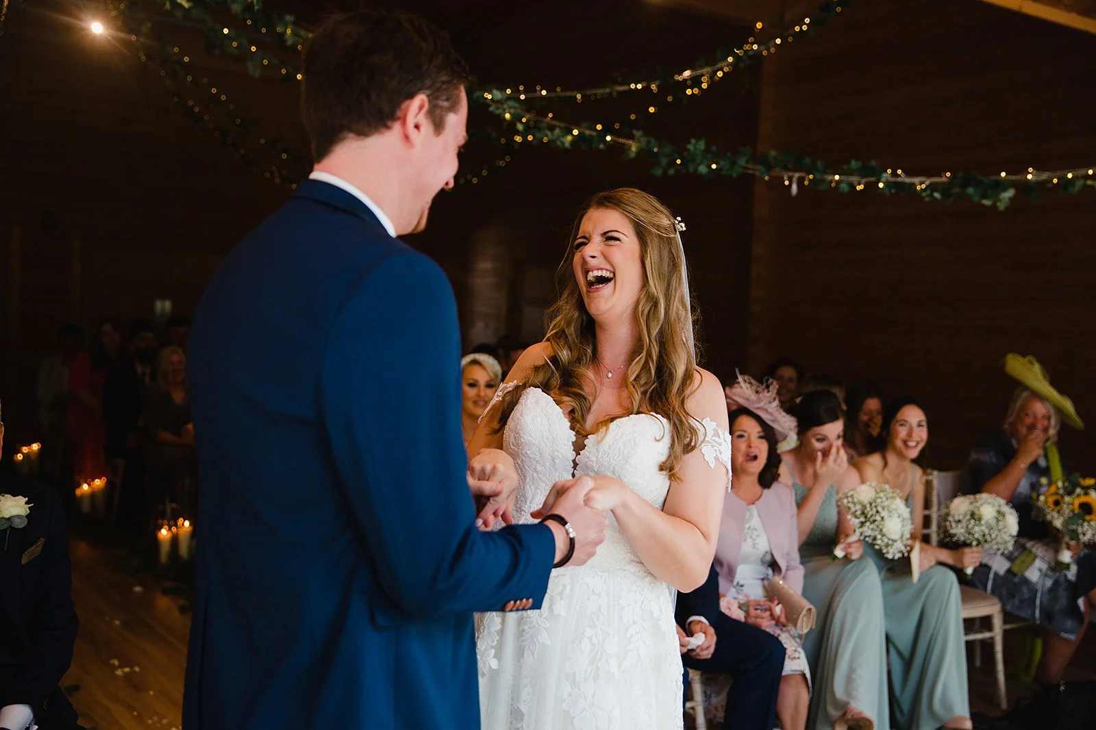 styal-lodge-wedding-ceremony-laughter-kerry-james.jpg