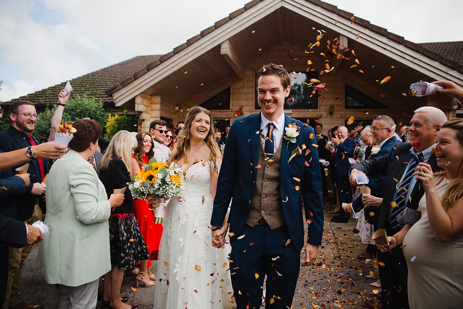 styal-lodge-wedding-confetti-outside.jpg