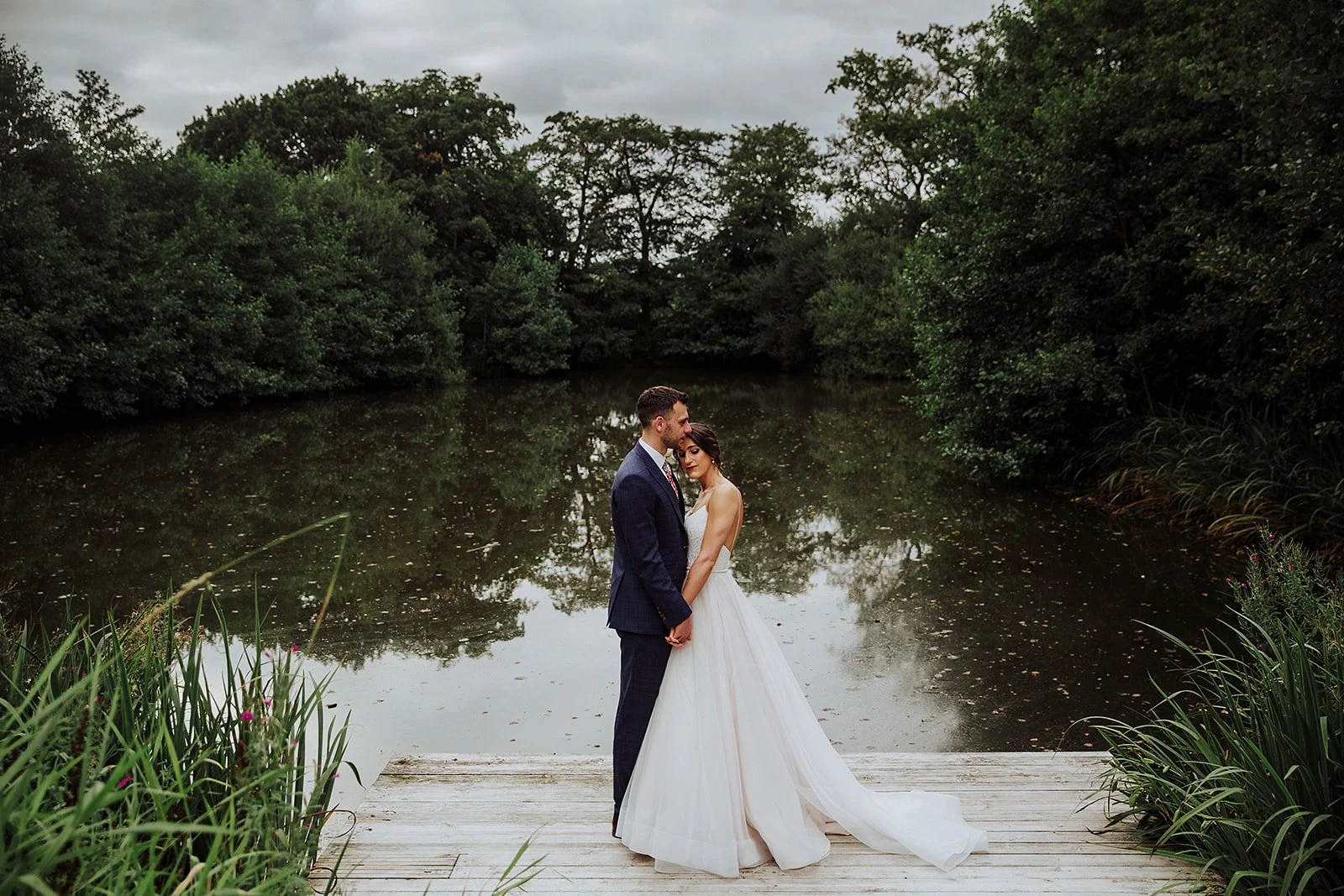 styal-lodge-lake-jetty-wedding-portrait.jpg