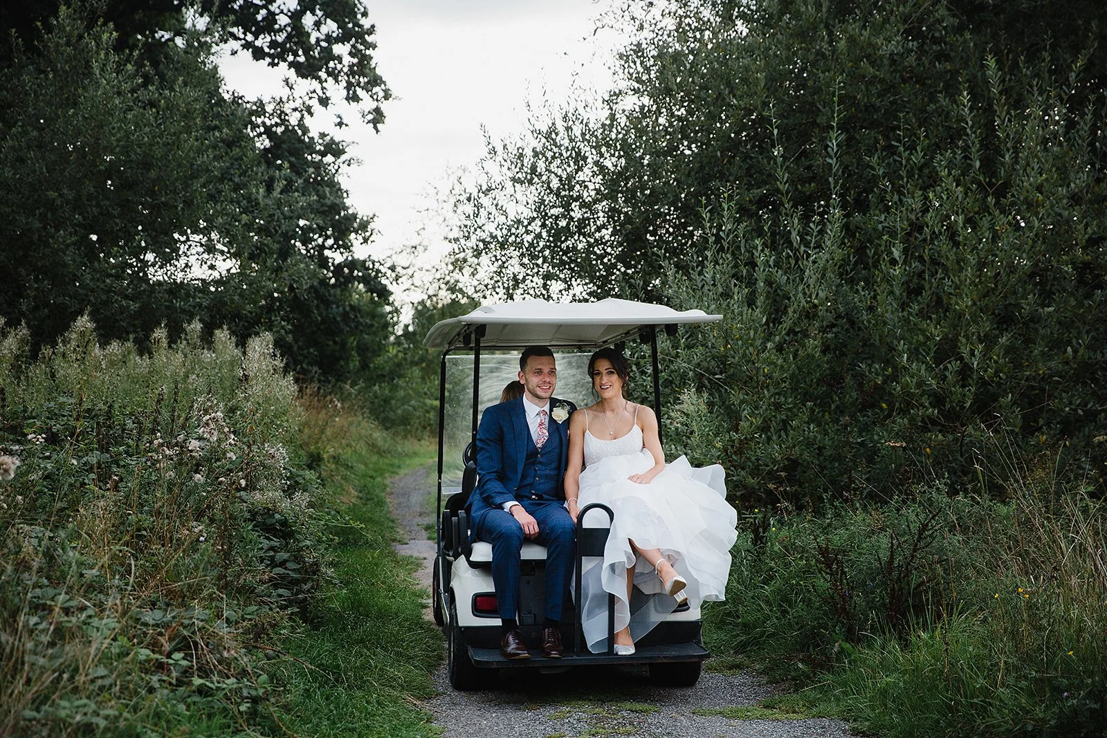styal-lodge-golf-buggy-ride-through-greenery.jpg