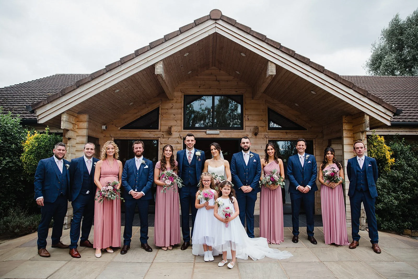 styal-lodge-entranceway-bridal-party-group.jpg