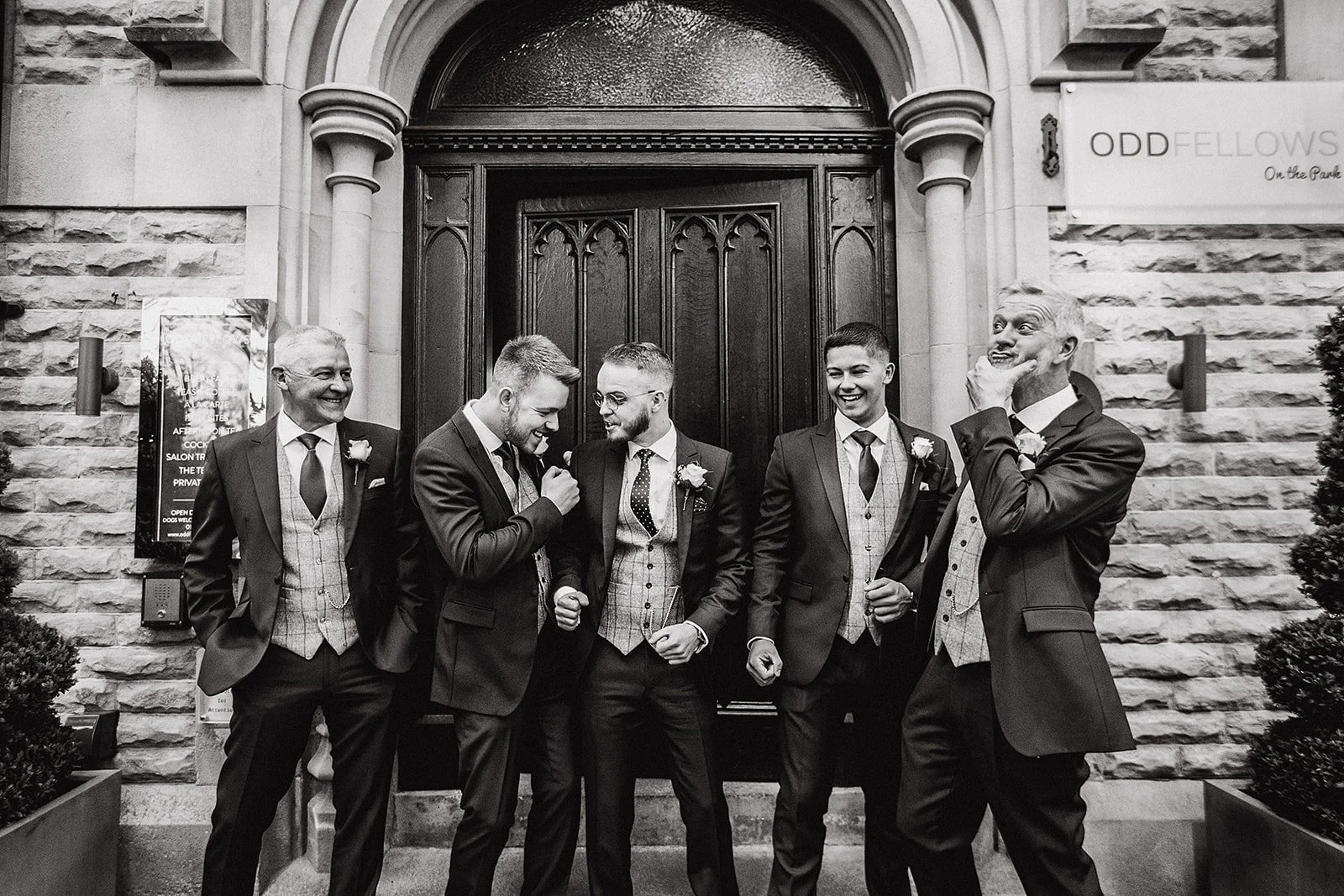 oddfellows-wedding-groomsmen-laughing-candid.jpg