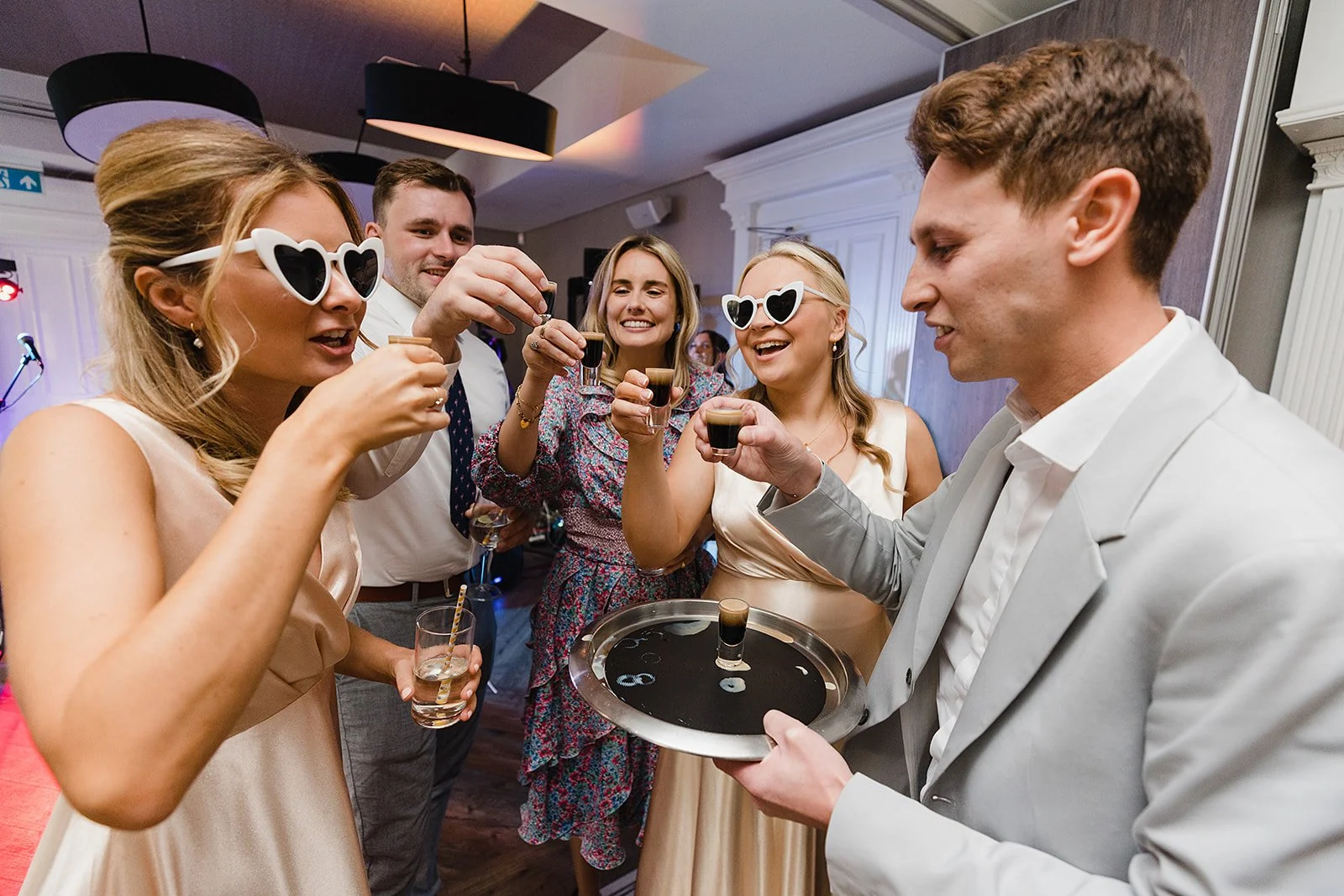 oddfellows-wedding-guests-celebratory-shots.jpg
