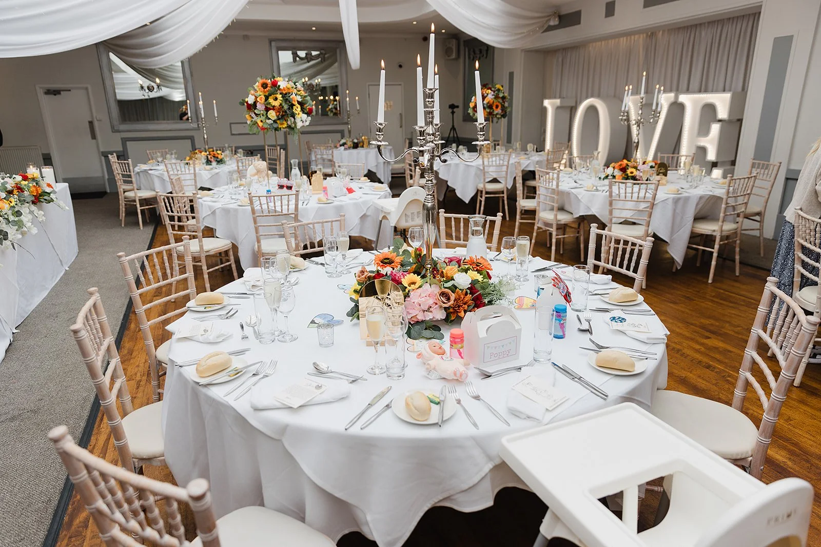 stirk-house-wedding-reception-room-floral-centrepieces.jpg