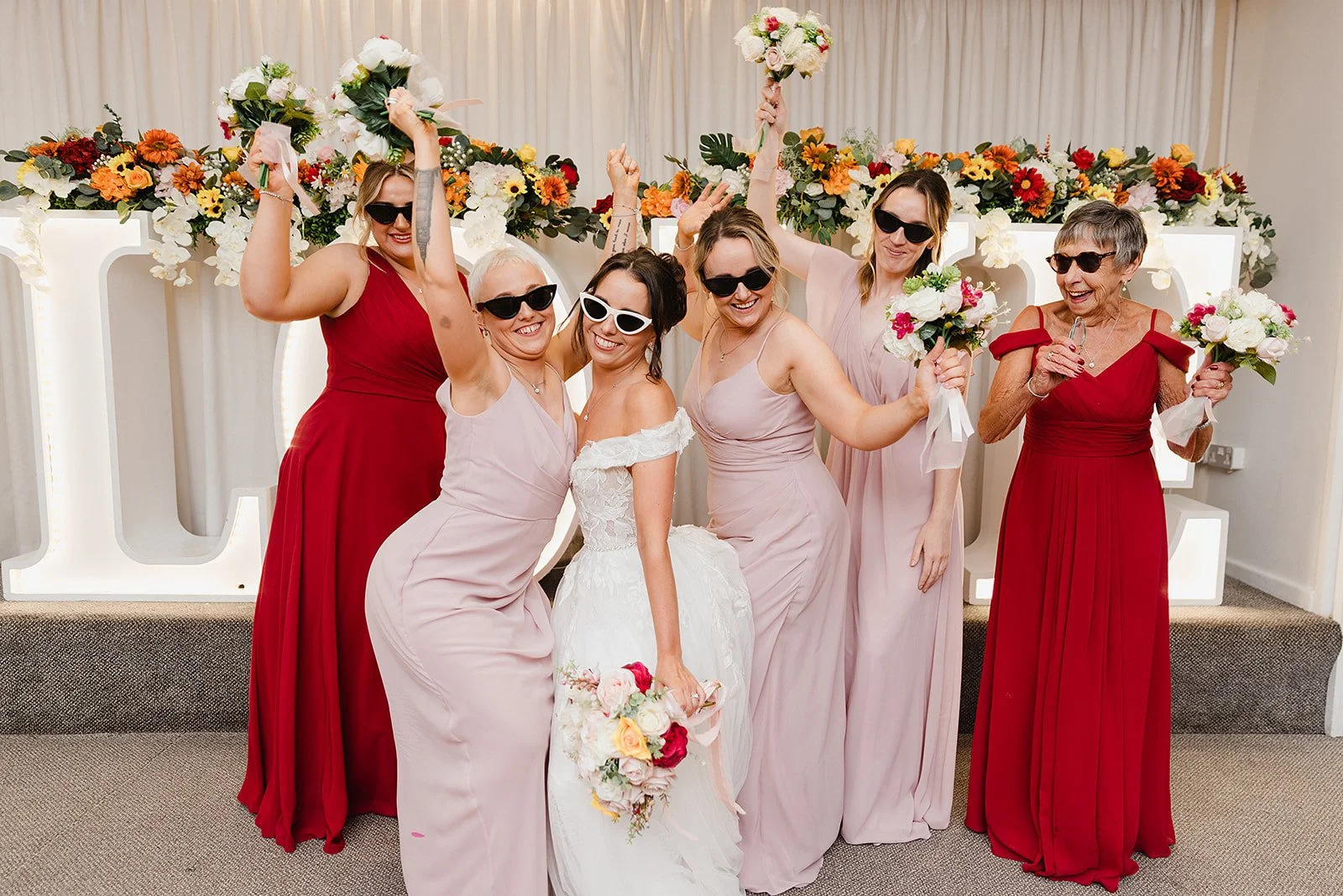 stirk-house-wedding-bridesmaids-sunglasses-love-letters.jpg
