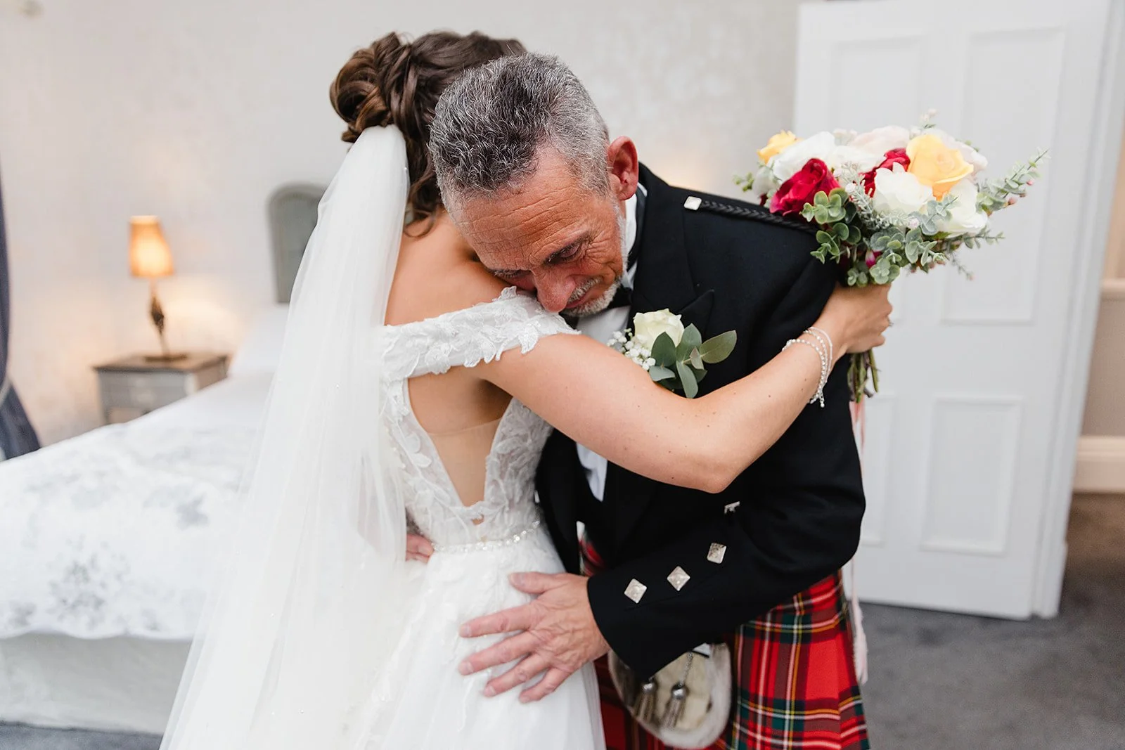 stirk-house-wedding-bride-hugging-father.jpg