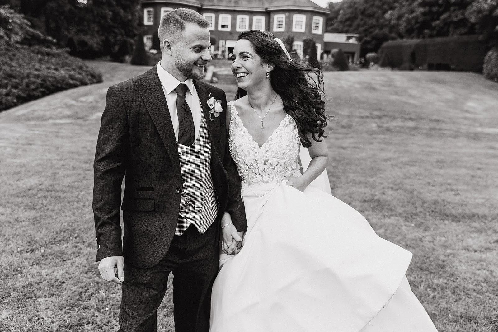 delamere-manor-wedding-photography-couple-walking.jpg