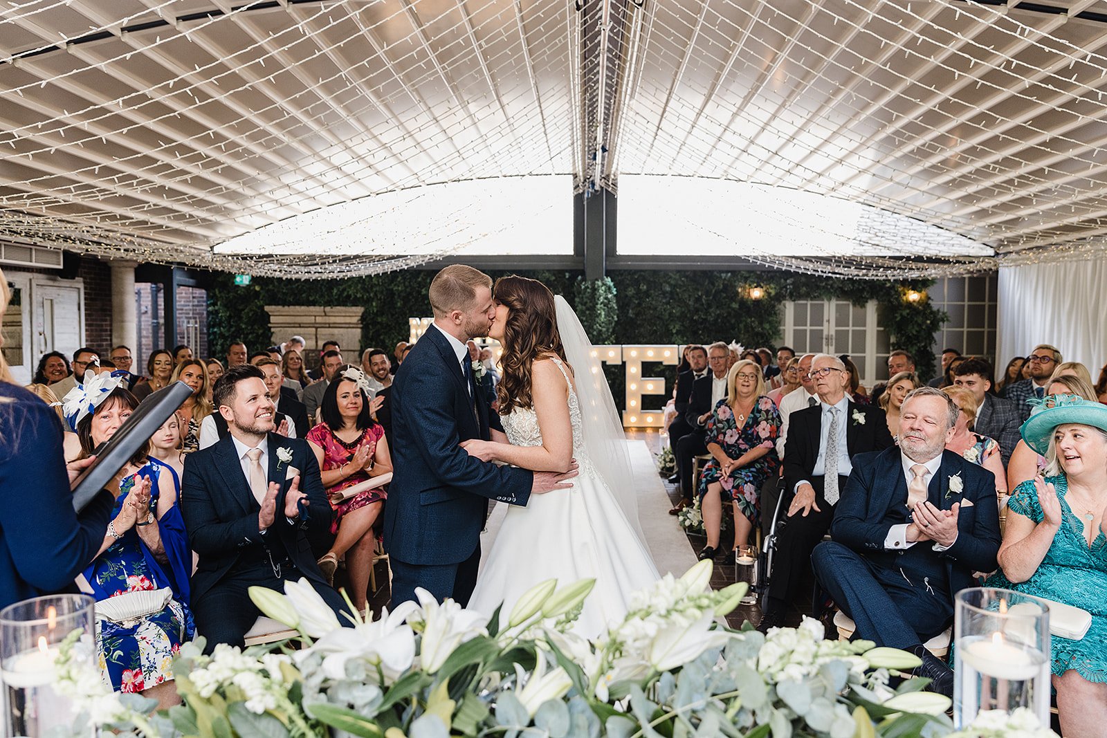 delamere-manor-wedding-first-kiss-glass-ceremony-room.jpg