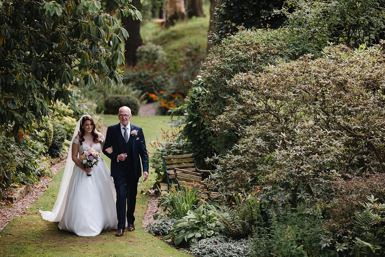 hilltop-country-house-wedding-bride-father-garden-walk.jpg
