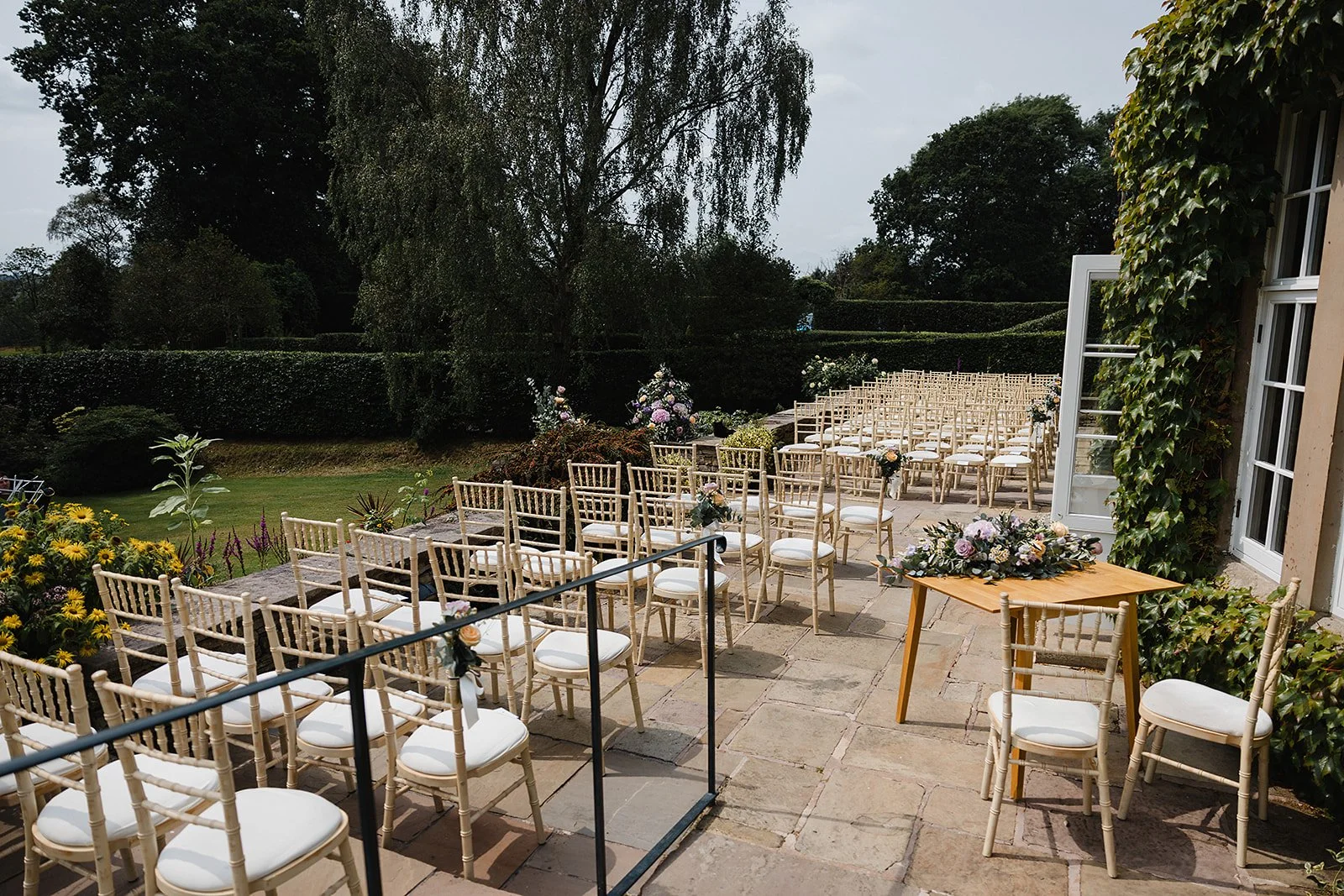 hilltop-country-house-wedding-outdoor-ceremony-terrace-ivy-house-setup.jpg