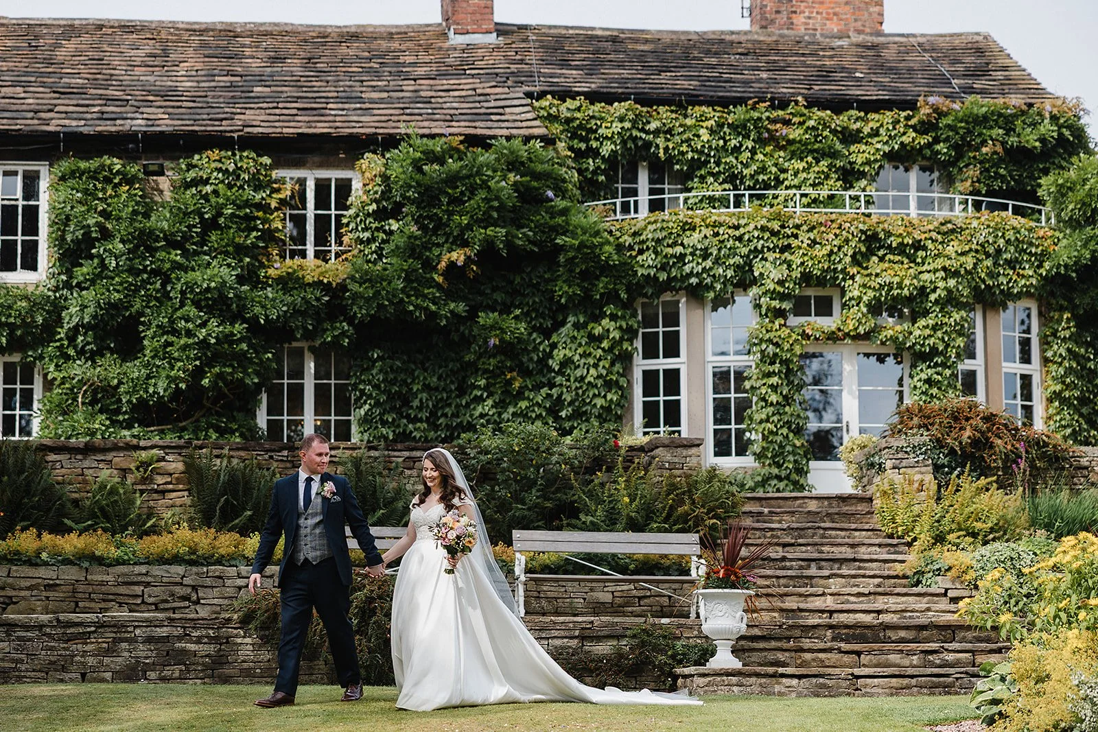 hilltop-country-house-wedding-ivy-building-walk.jpg