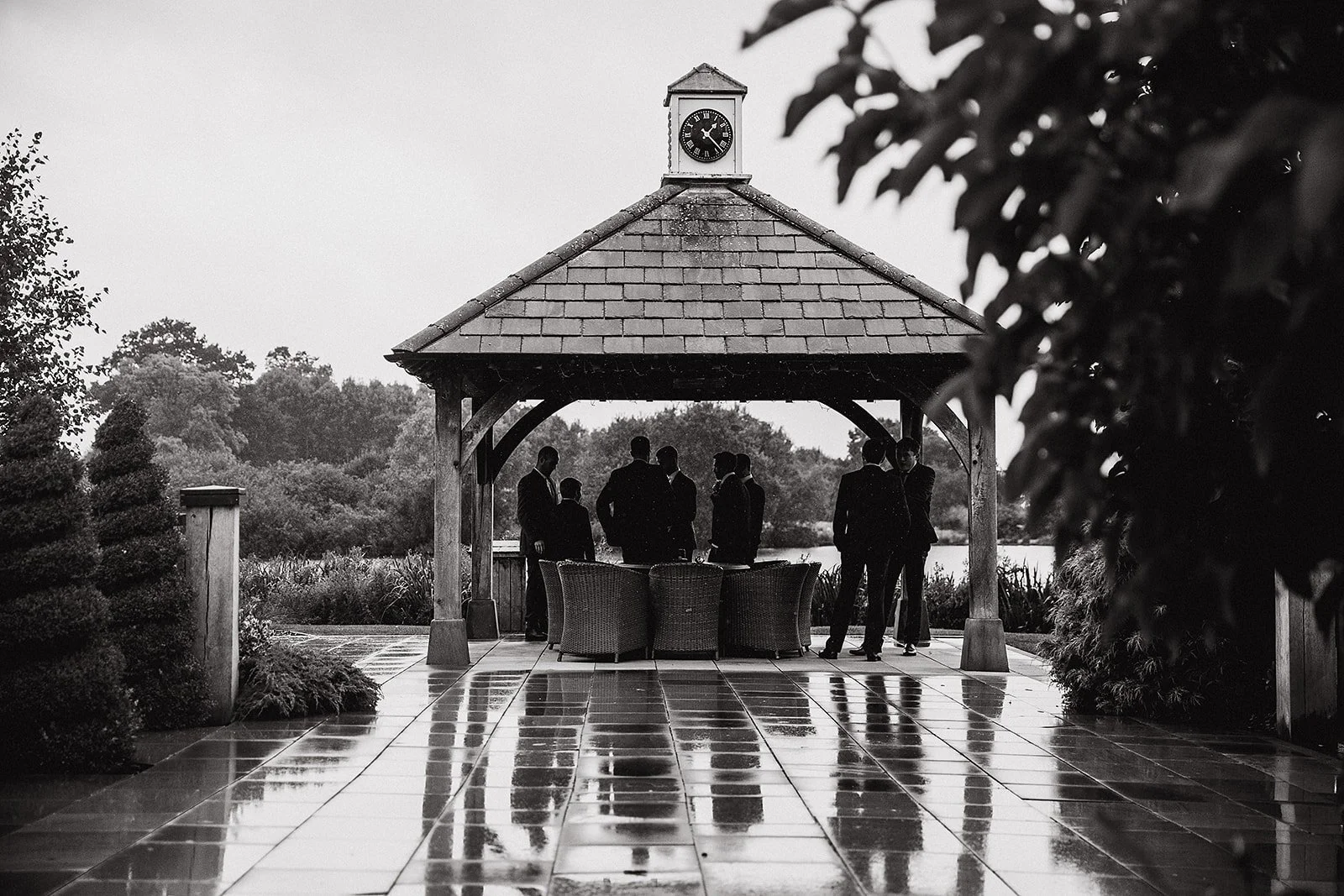 sandhole-oak-barn-wedding-groomsmen-clock-tower-pavilion.jpg