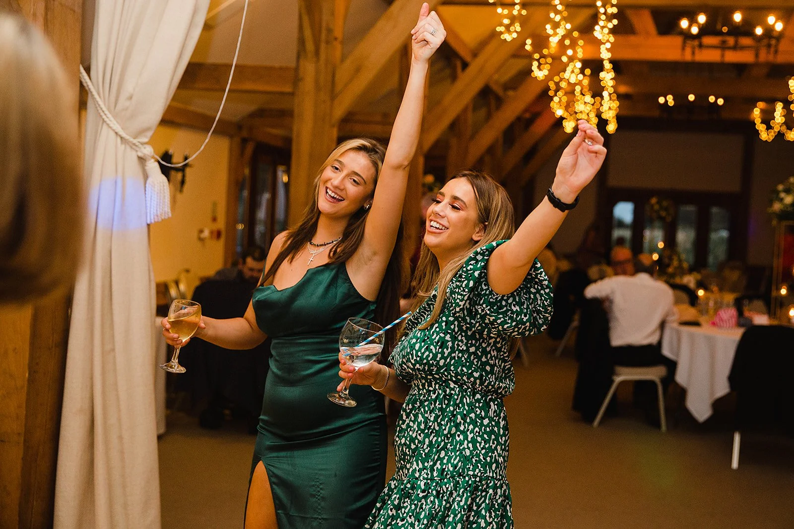 sandhole-oak-barn-wedding-reception-guests-cheering.jpg