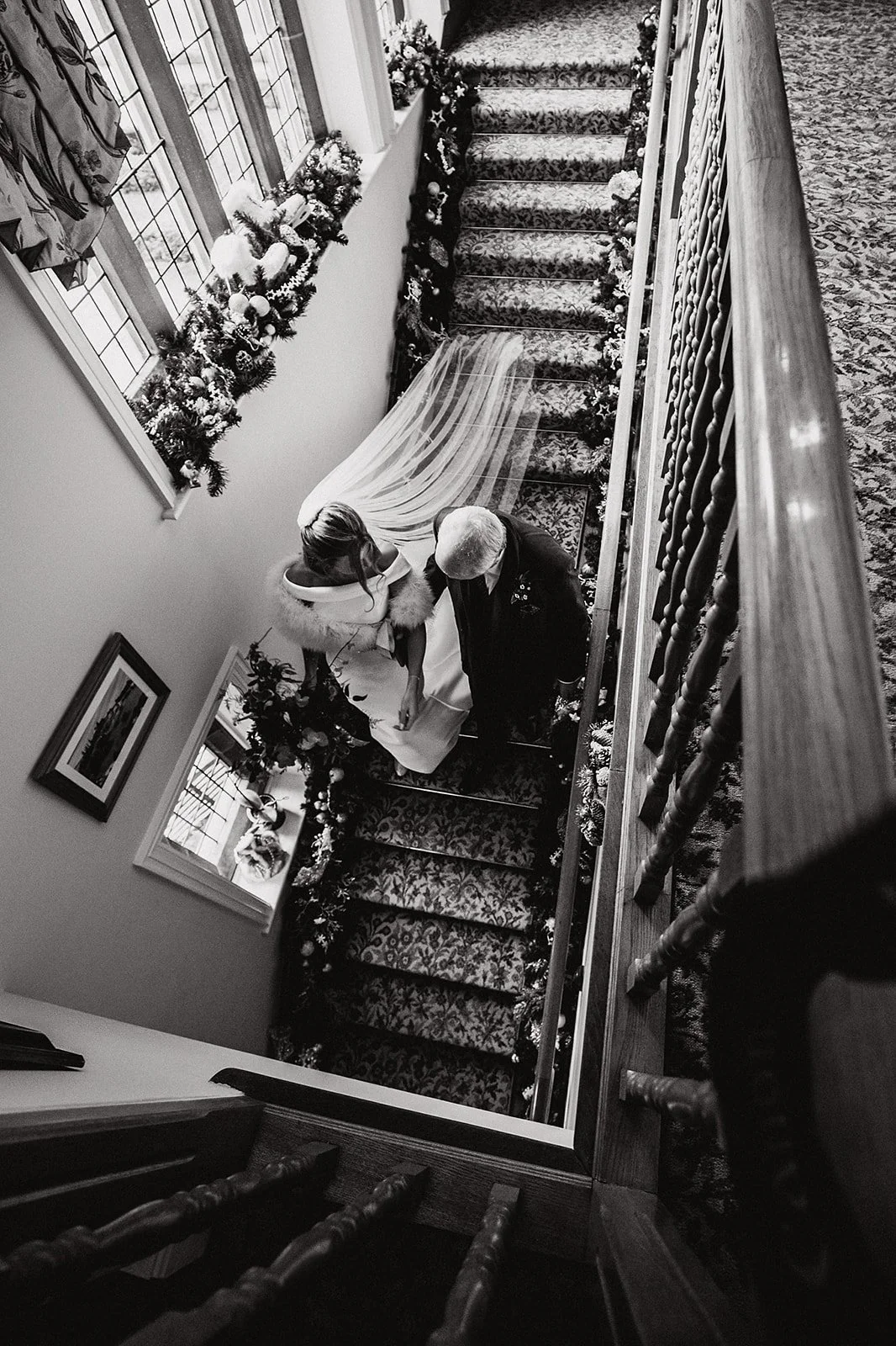 colshaw-hall-christmas-wedding-bride-father-staircase-moment.jpg