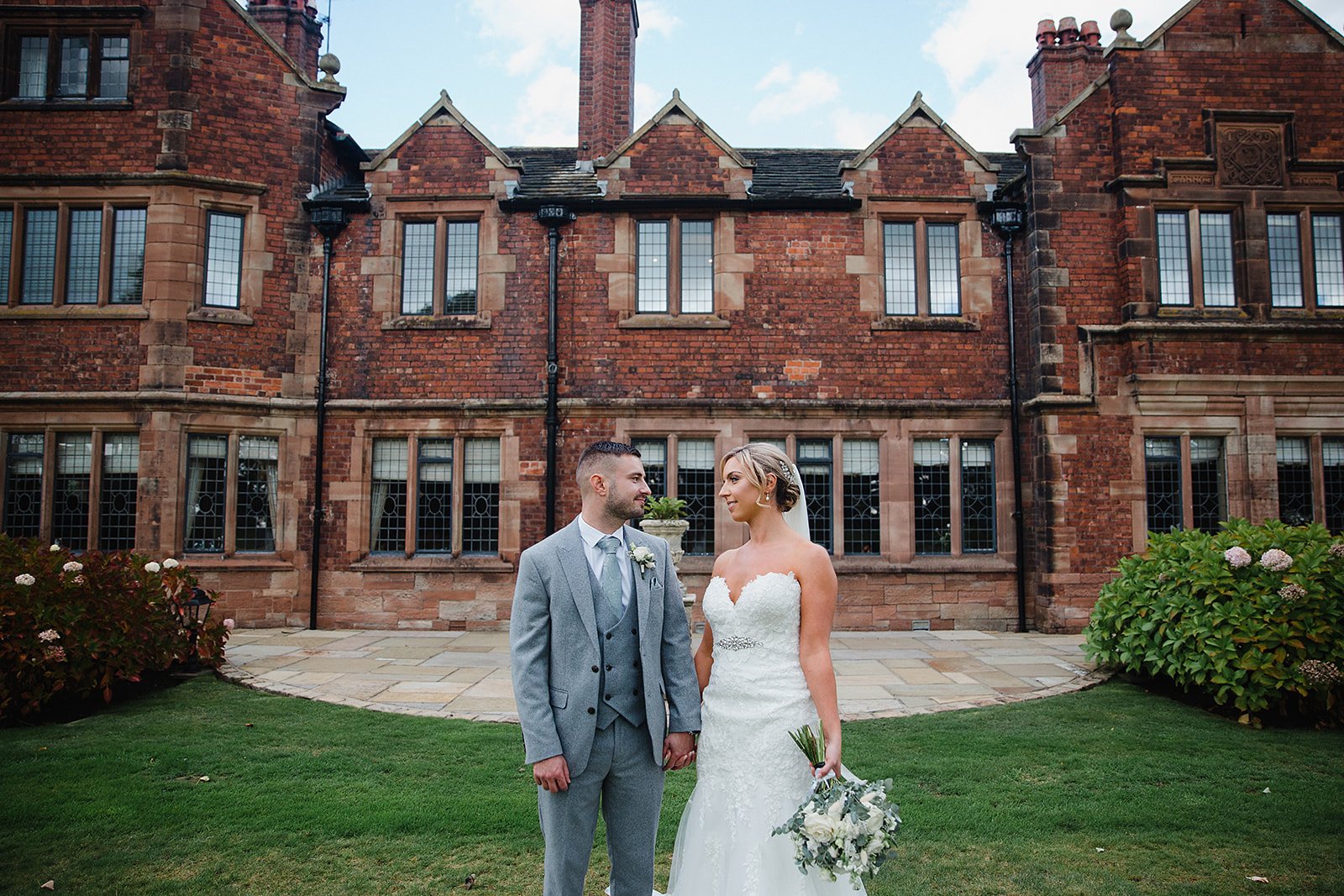 colshaw-hall-wedding-photography-couple-outside-manor.jpg