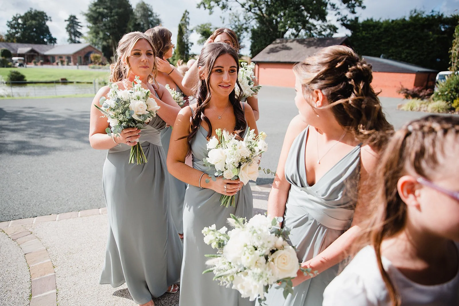 colshaw-hall-the-pavilion-bridesmaids-grey-dresses-bouquets.jpg
