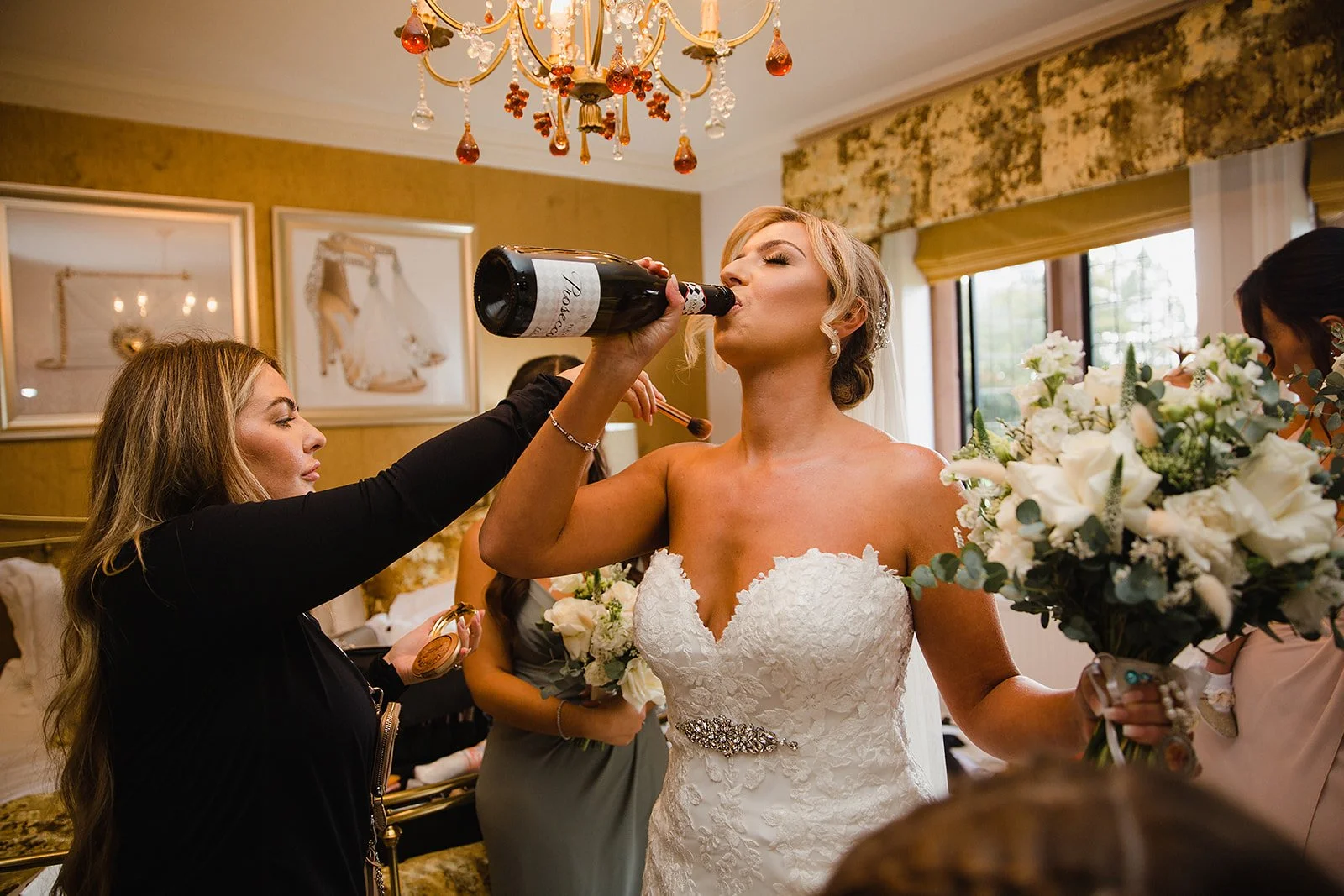 colshaw-hall-wedding-photography-bride-champagne-with-bridesmaids.jpg