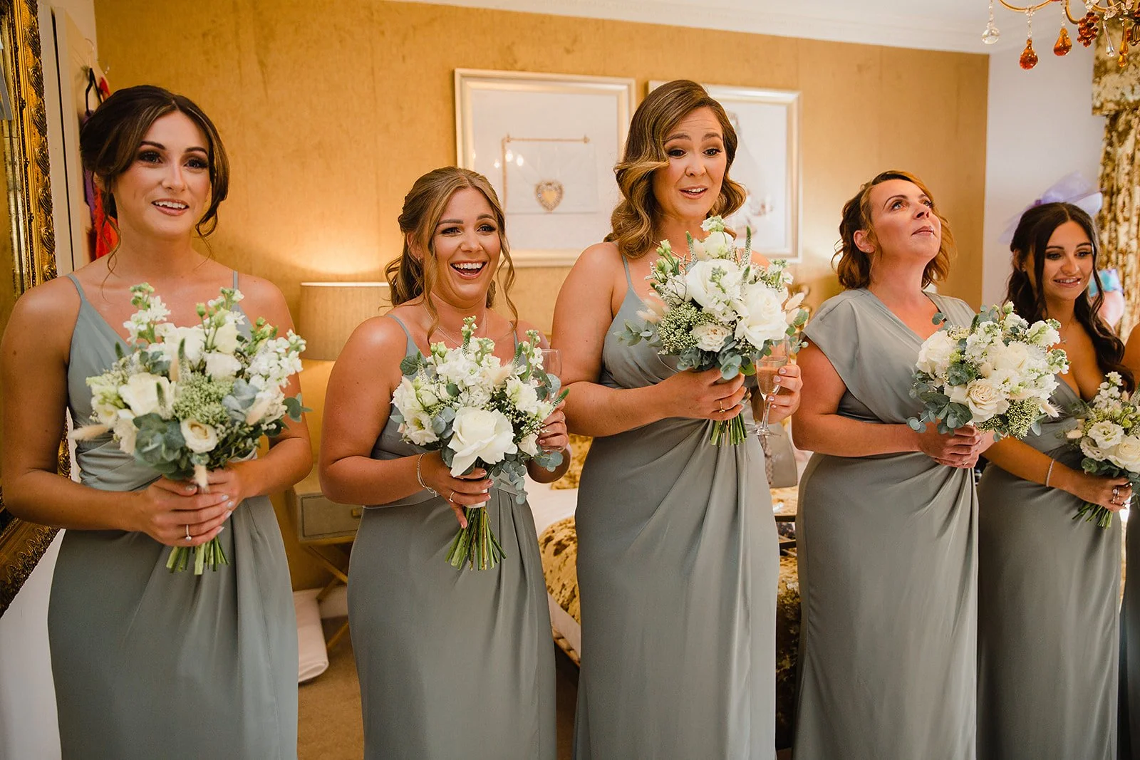 colshaw-hall-wedding-photography-bridesmaids-reaction-bouquets.jpg