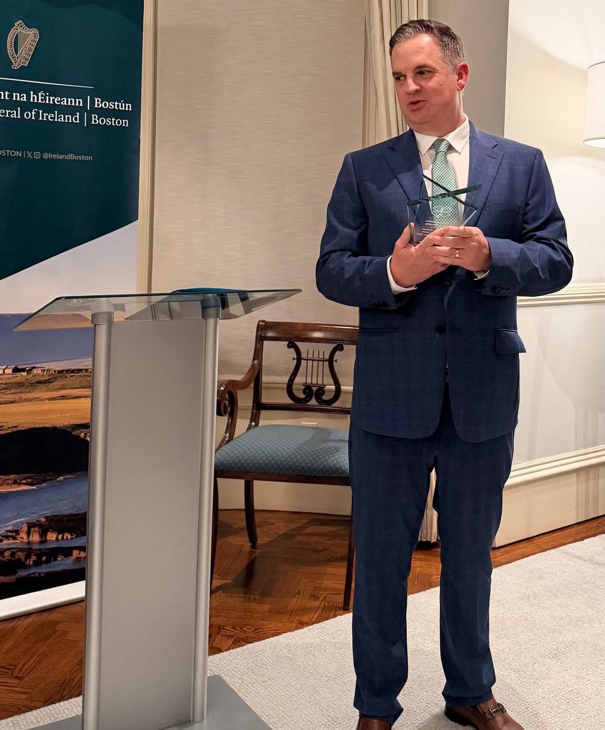 Jamie Murphy with award.jpg