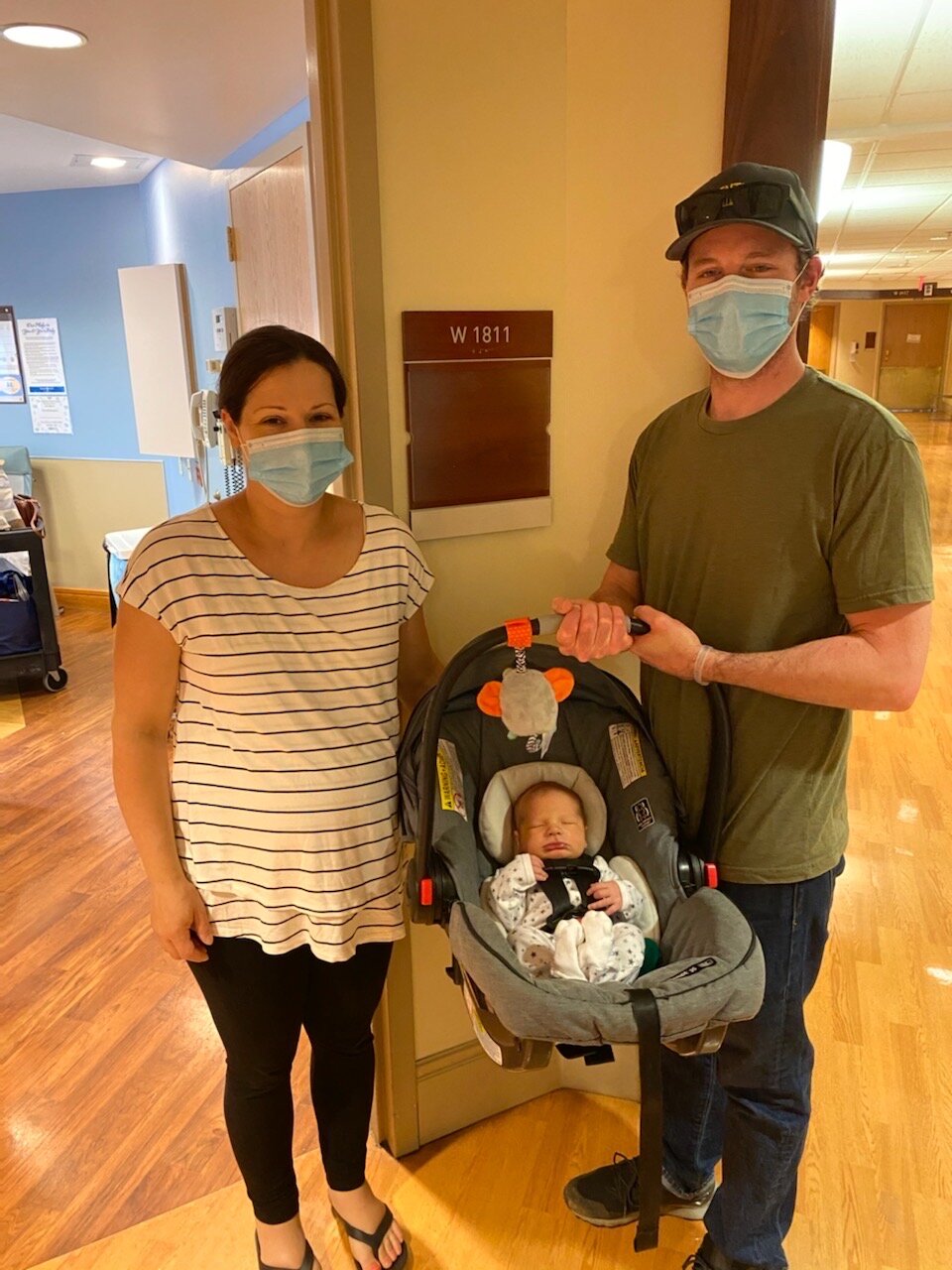 Donna and family with masks at hospital dc.JPG