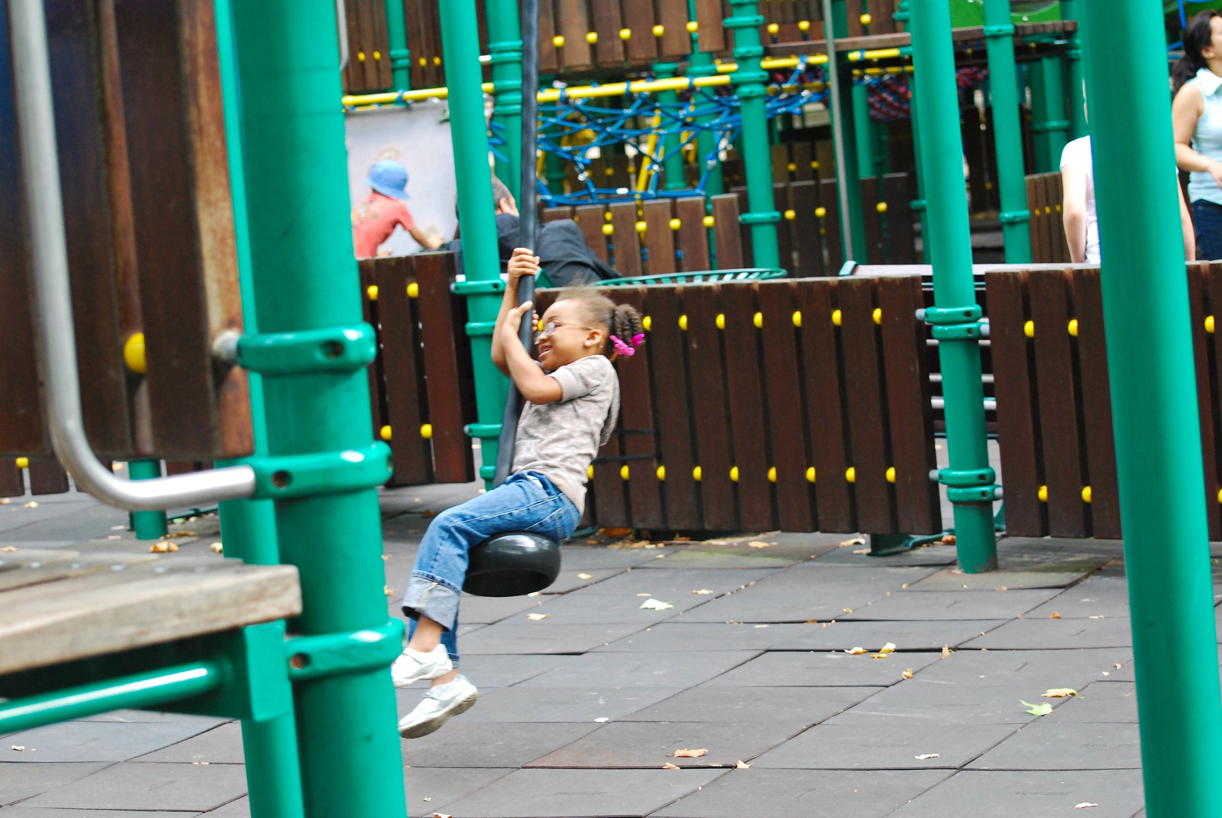 Paris - Blog - Leilah Swinging in Luxembourg Gardens.jpg