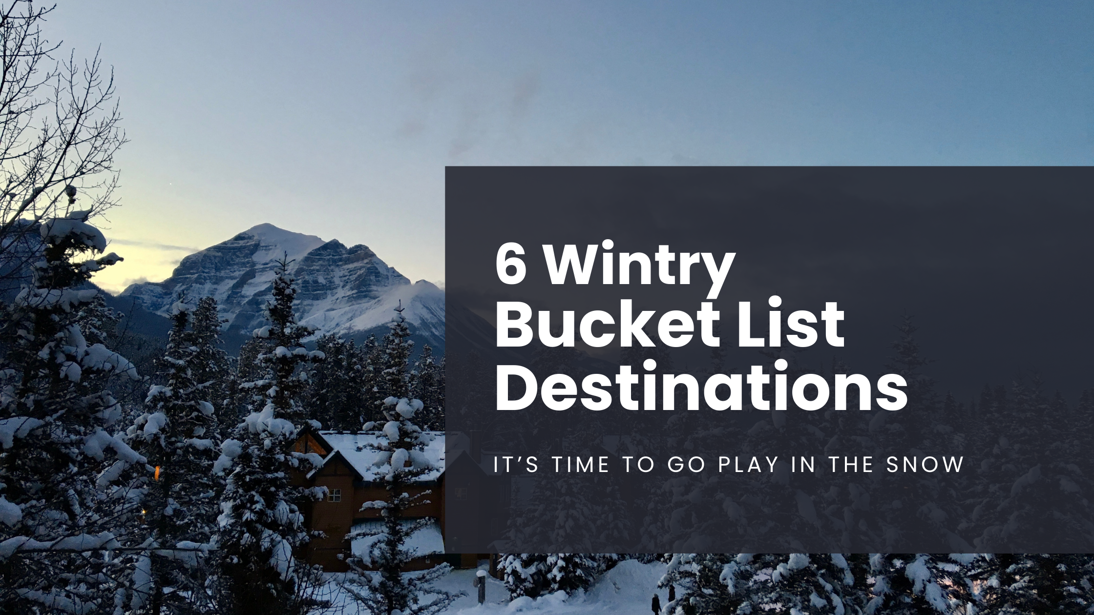 The Canadian Alps covered in snow and standing tall as the daylight dims