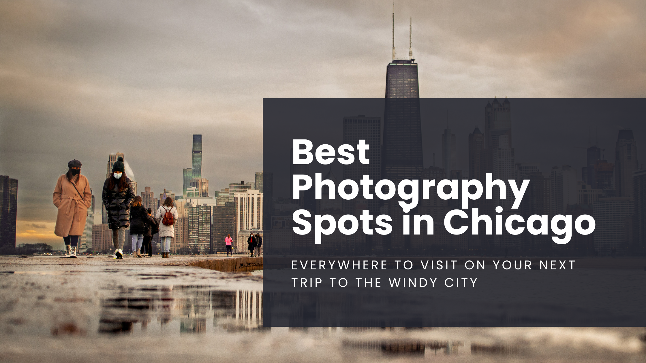 Chicagoans enjoy a frigid evening walk on North Ave Beach with downtown Chicago in the background