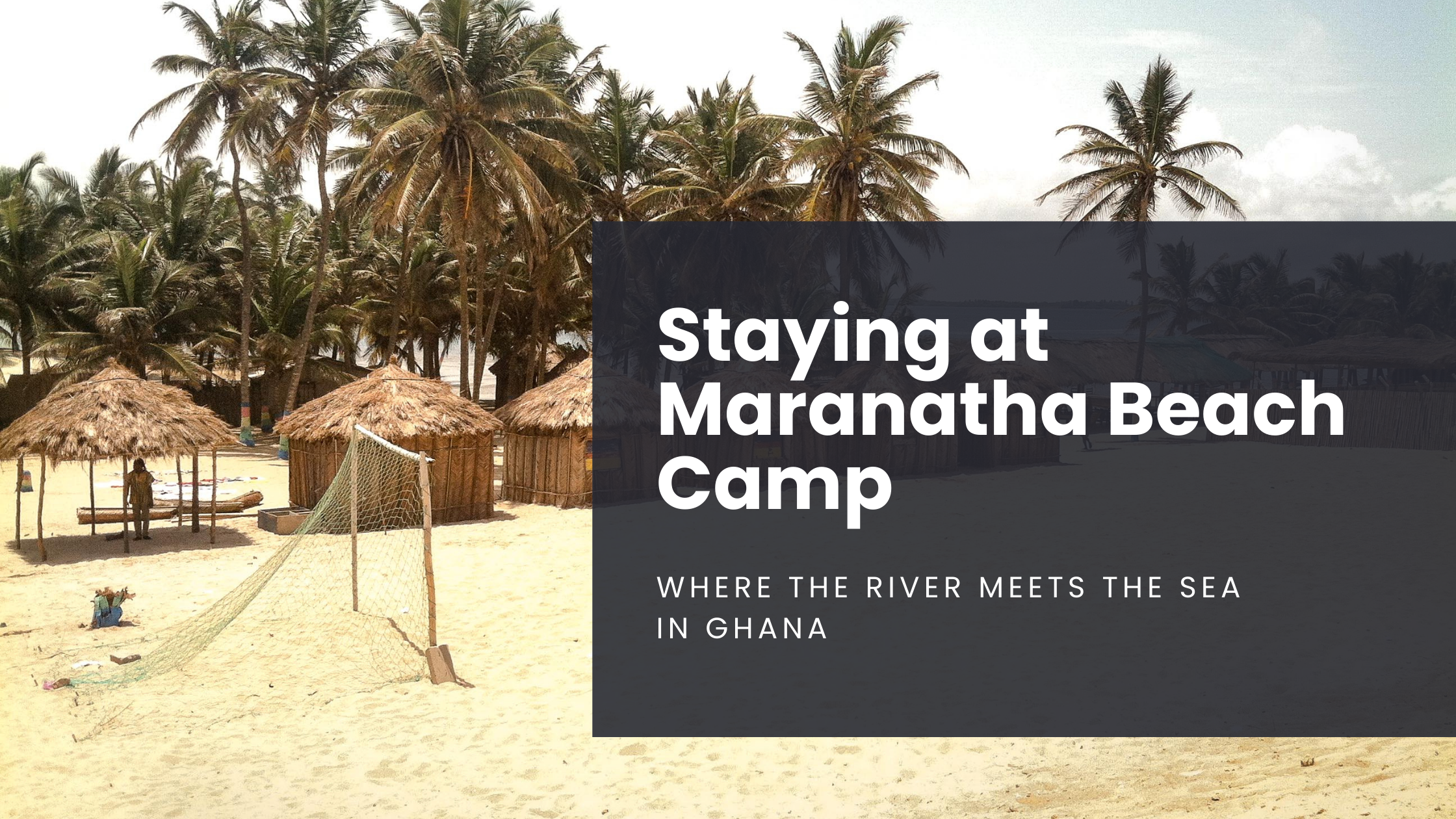 A sand football court at Maranatha Beach Camp sits in the foreground, with palm trees above providing shade in Ghana