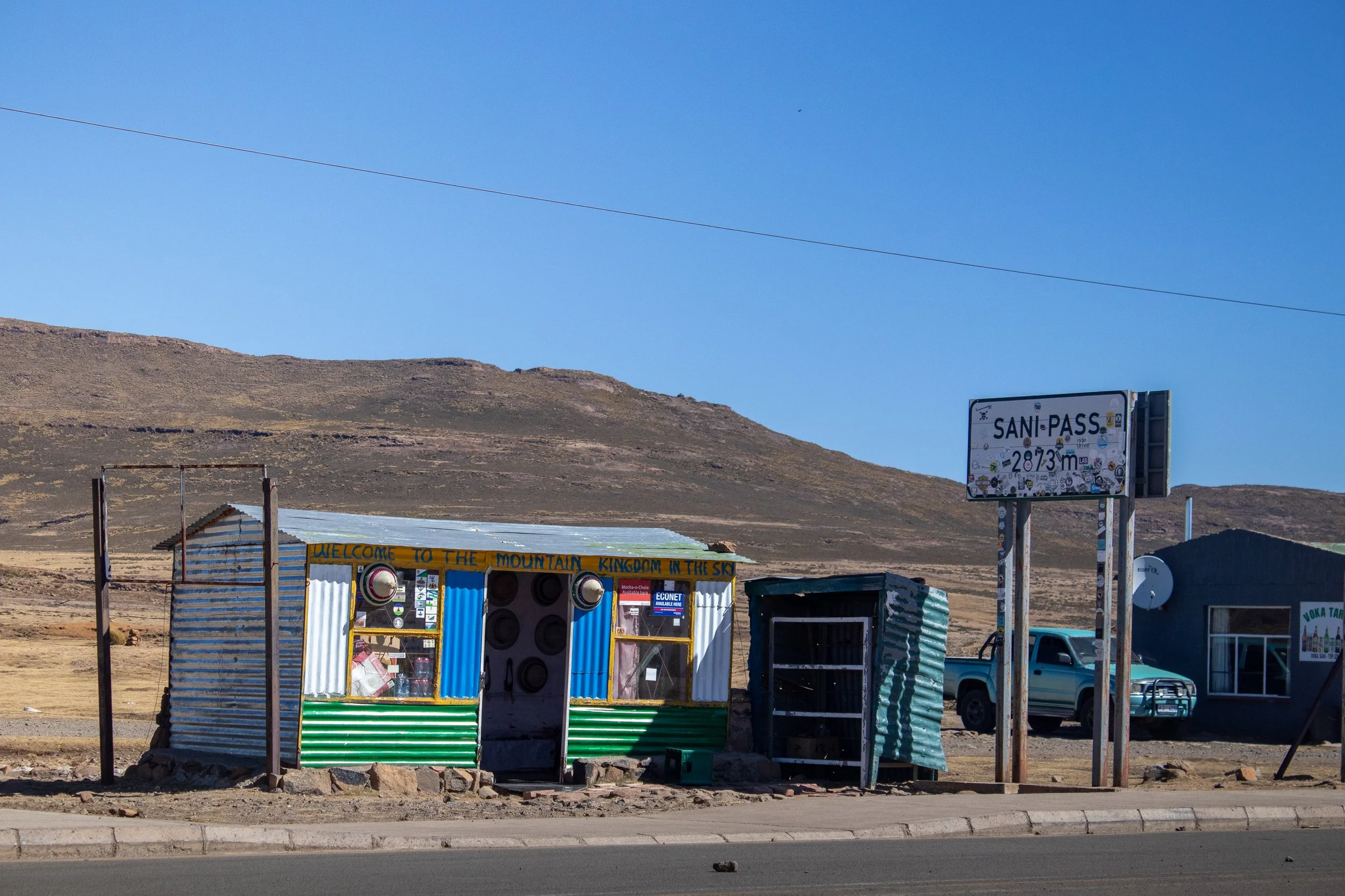 Small shops line the road on the Lesotho side of the famed Sani Pass