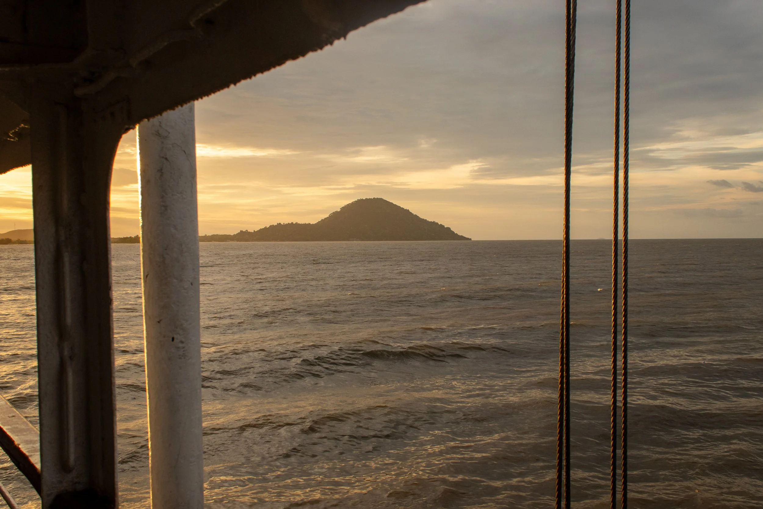 The sun sets on Lake Malawi, as shot from the second deck of the MV Ilala Ferry as moves north along the lake