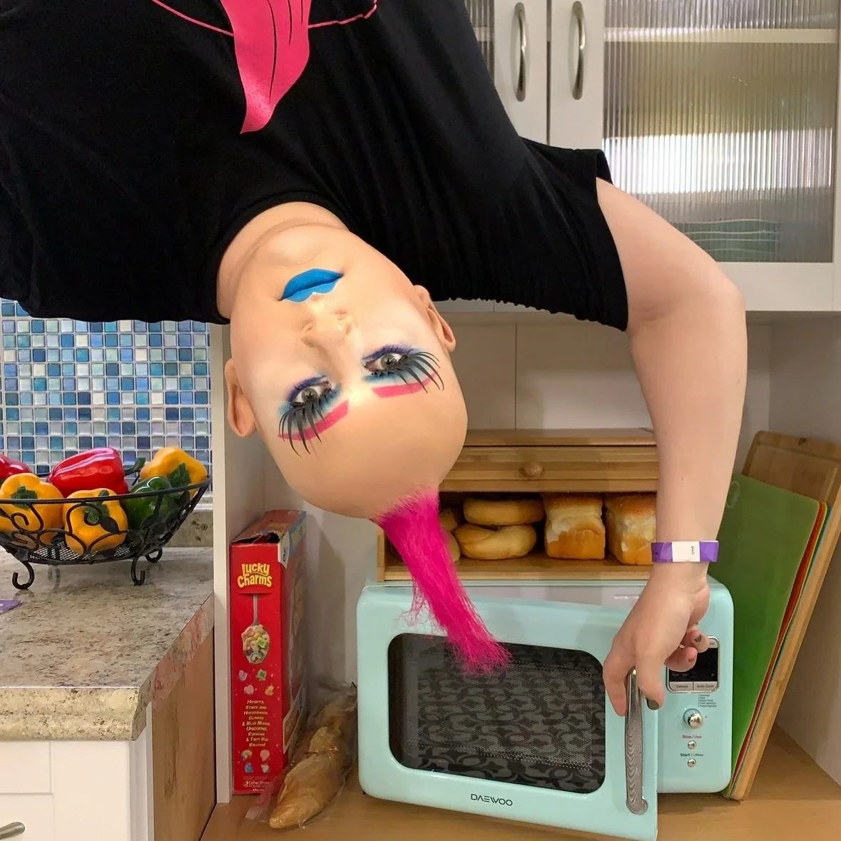 Hanging upside down to honor the real star of National Microwave Day - the machine that&rsquo;s reheated more post-gig leftovers than I care to admit. ⚡️🔥🍕 #NationalMicrowaveDay