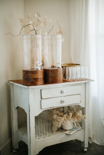  rentals pictured:   -white wooden cart $30  -clear acrylic drink dispensers with wood stand $15 each 