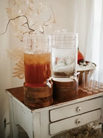  rentals pictured  -white wooden cart $30  -Acrylic Drink Dispenser with Wood Stand $15 each 
