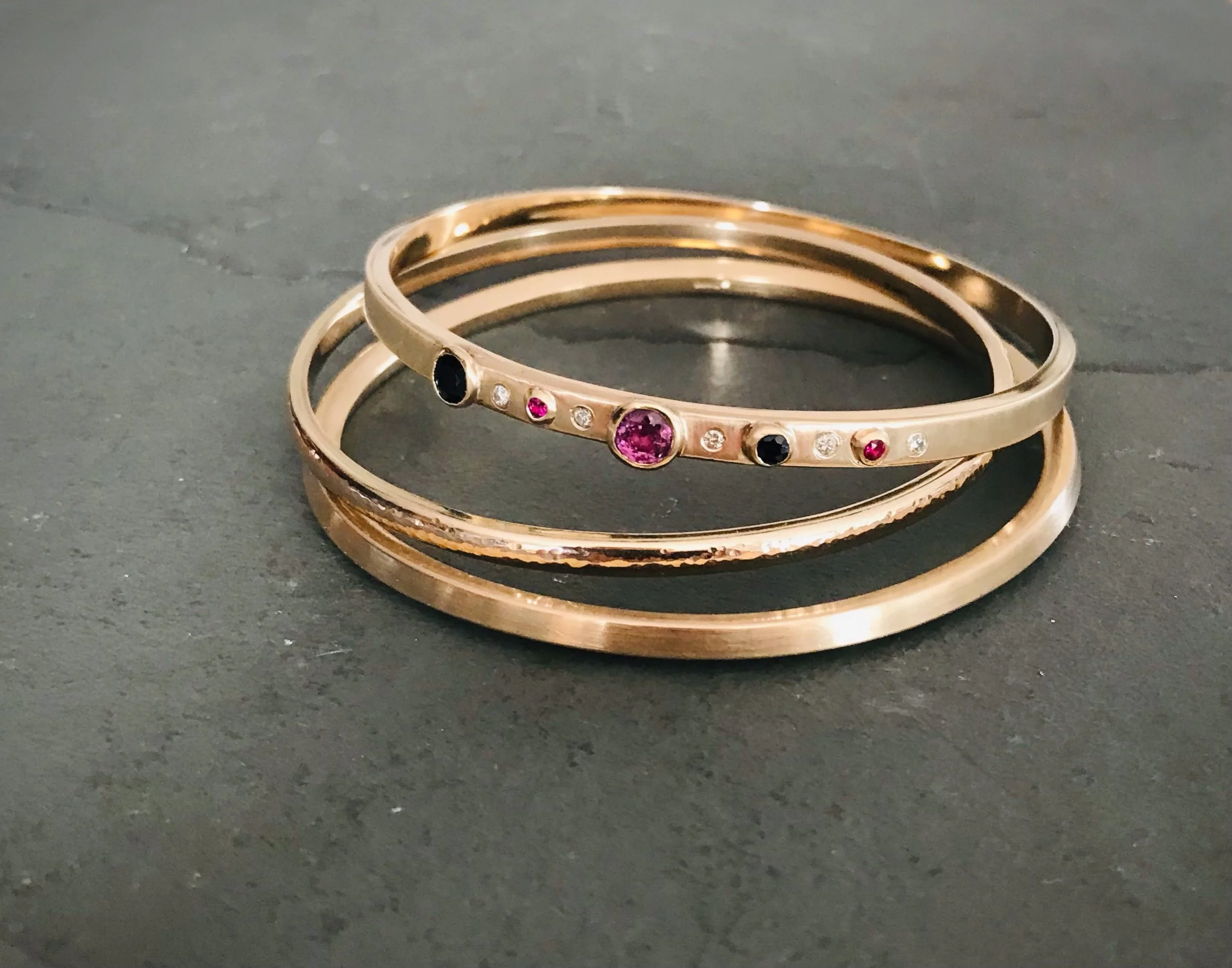 Trio of solid heirloom gold bangles 